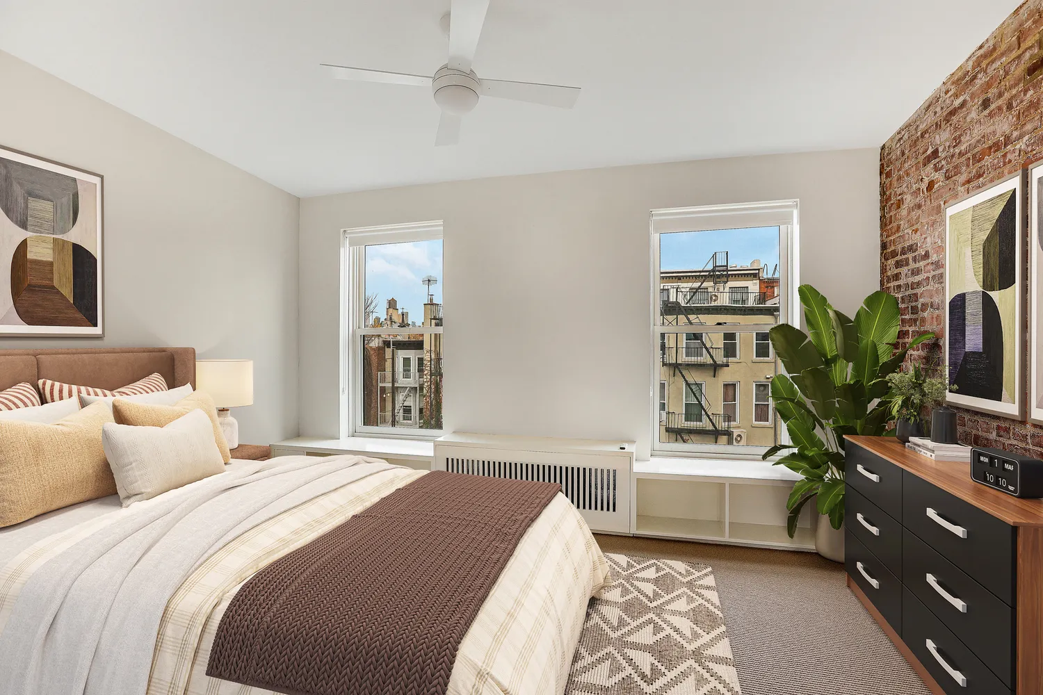 a bedroom with a bed and a couch