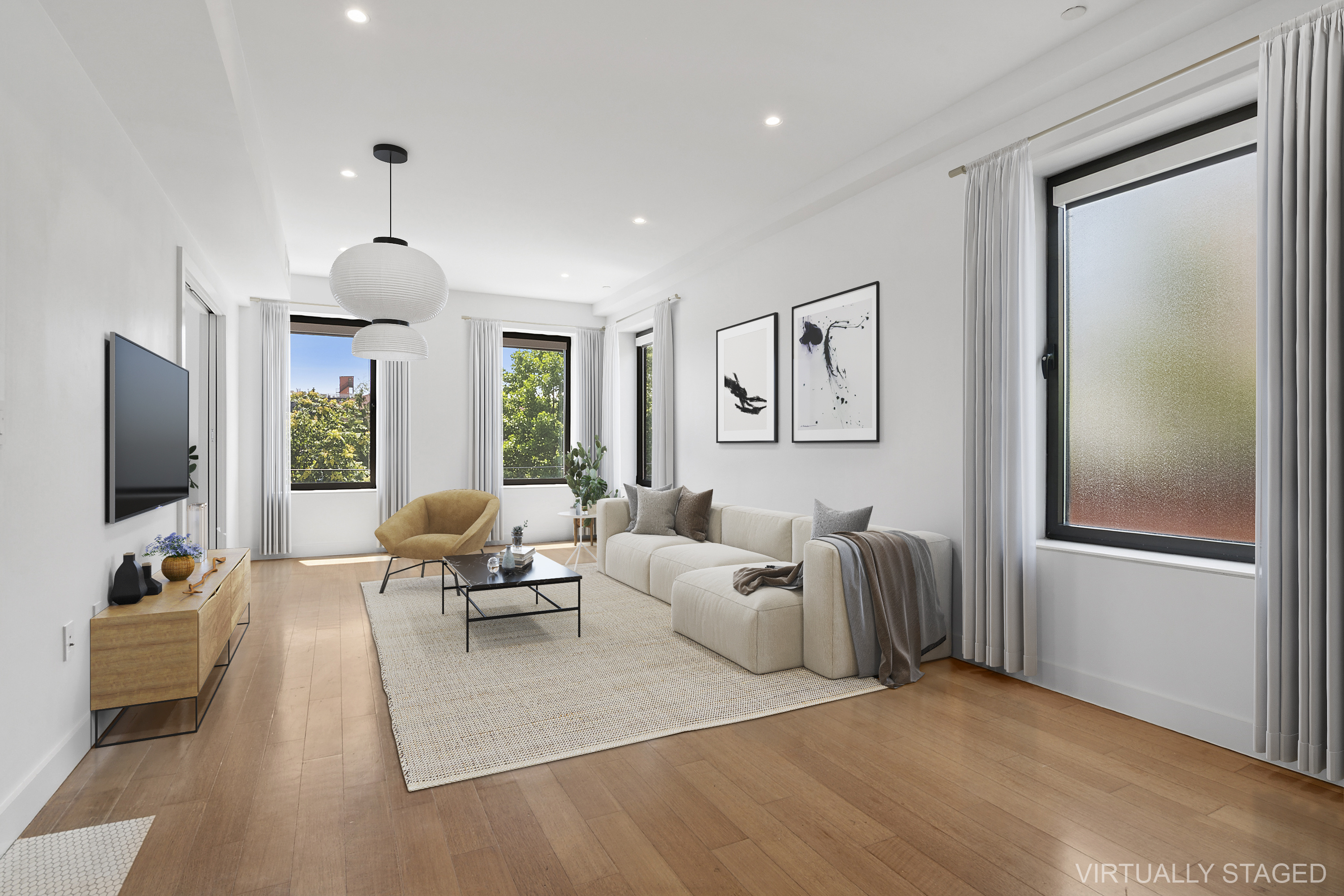 162 Beard Street, Unit 3 Brooklyn, NY 11231 - Photo 1 of 12 a living room with furniture and a flat screen tv
