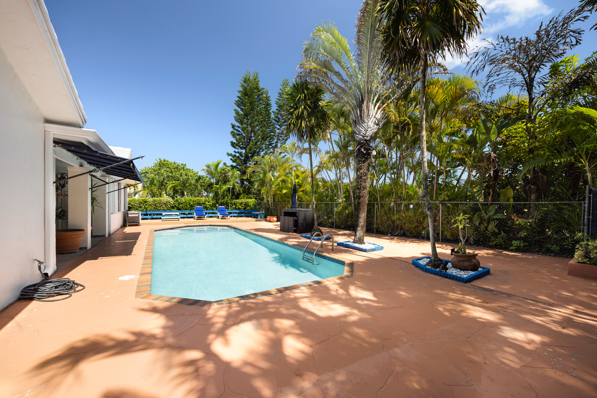 8610 Southwest 83rd Street Miami, FL 33143 - Photo 10 of 46 a view of a swimming pool with a patio