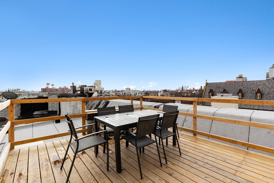 65 Bond Street, Unit 4 Brooklyn, NY 11217 - Photo 1 of 7 a view of a terrace with seating area