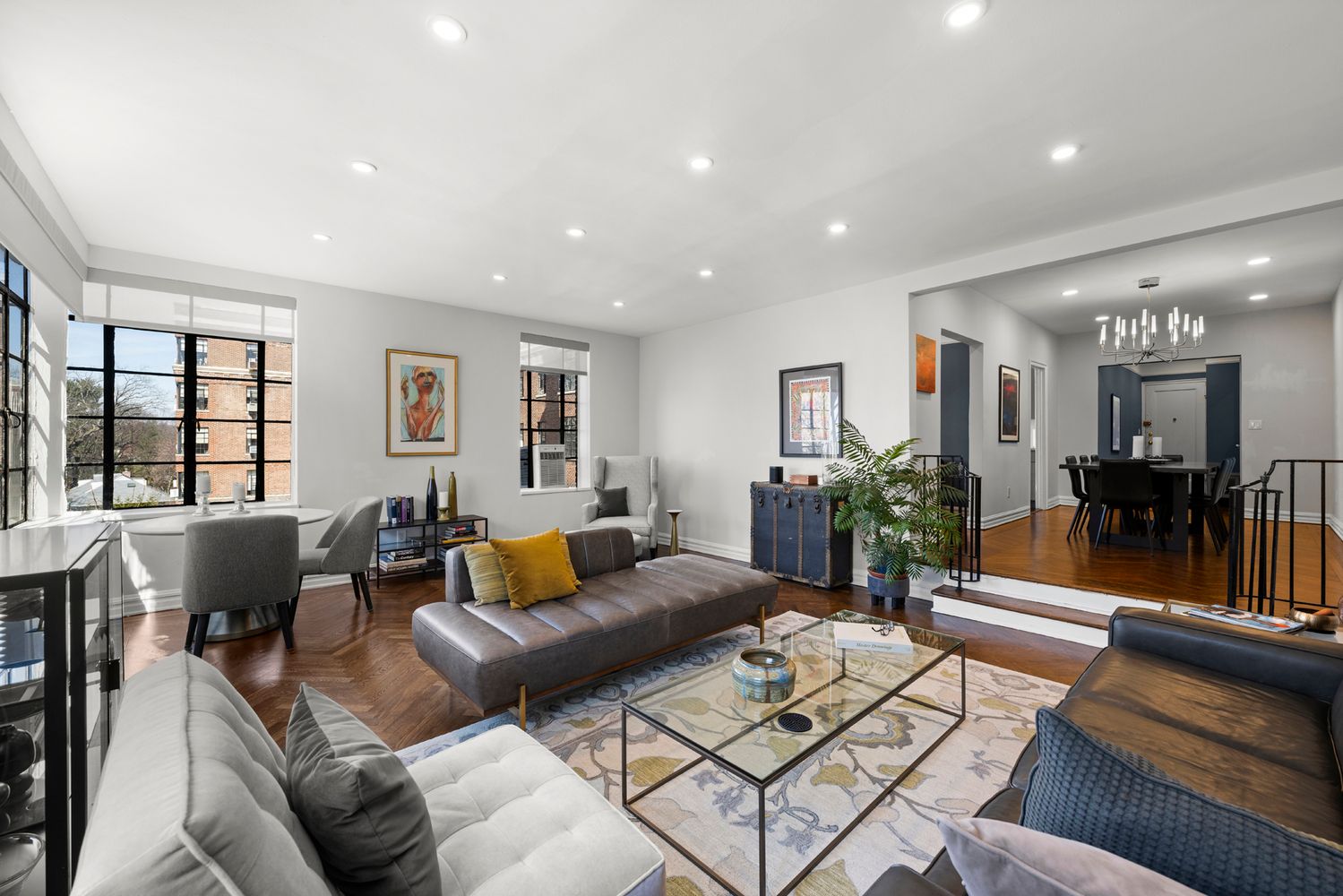 a living room with furniture and a table