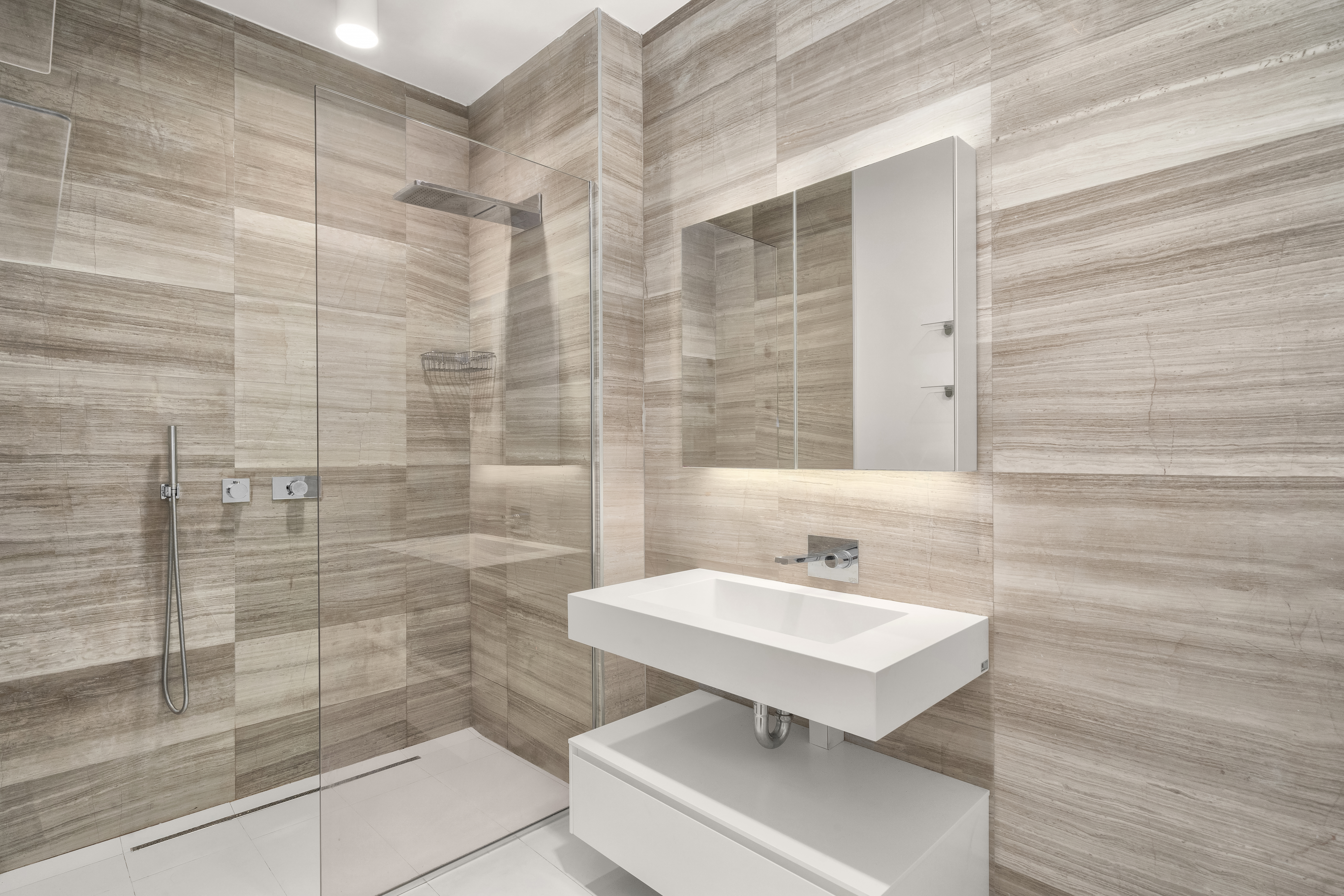 160 Imlay Street, Unit 5A2 Brooklyn, NY 11231 - Photo 8 of 14 a bathroom with a sink a toilet and shower