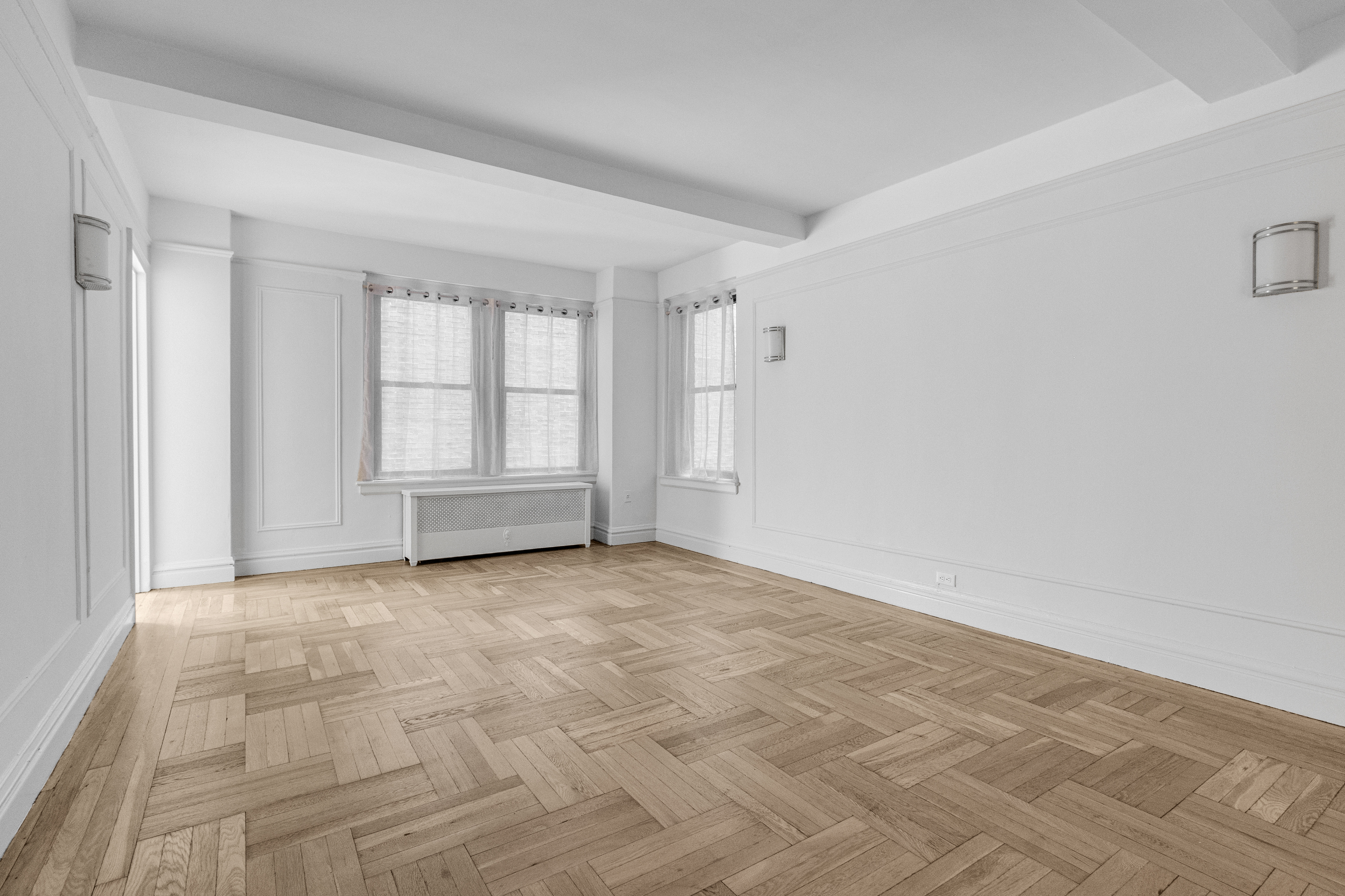 127 West 96th Street, Unit 4D Manhattan, NY 10025 - Photo 2 of 14 a view of an empty room with a window