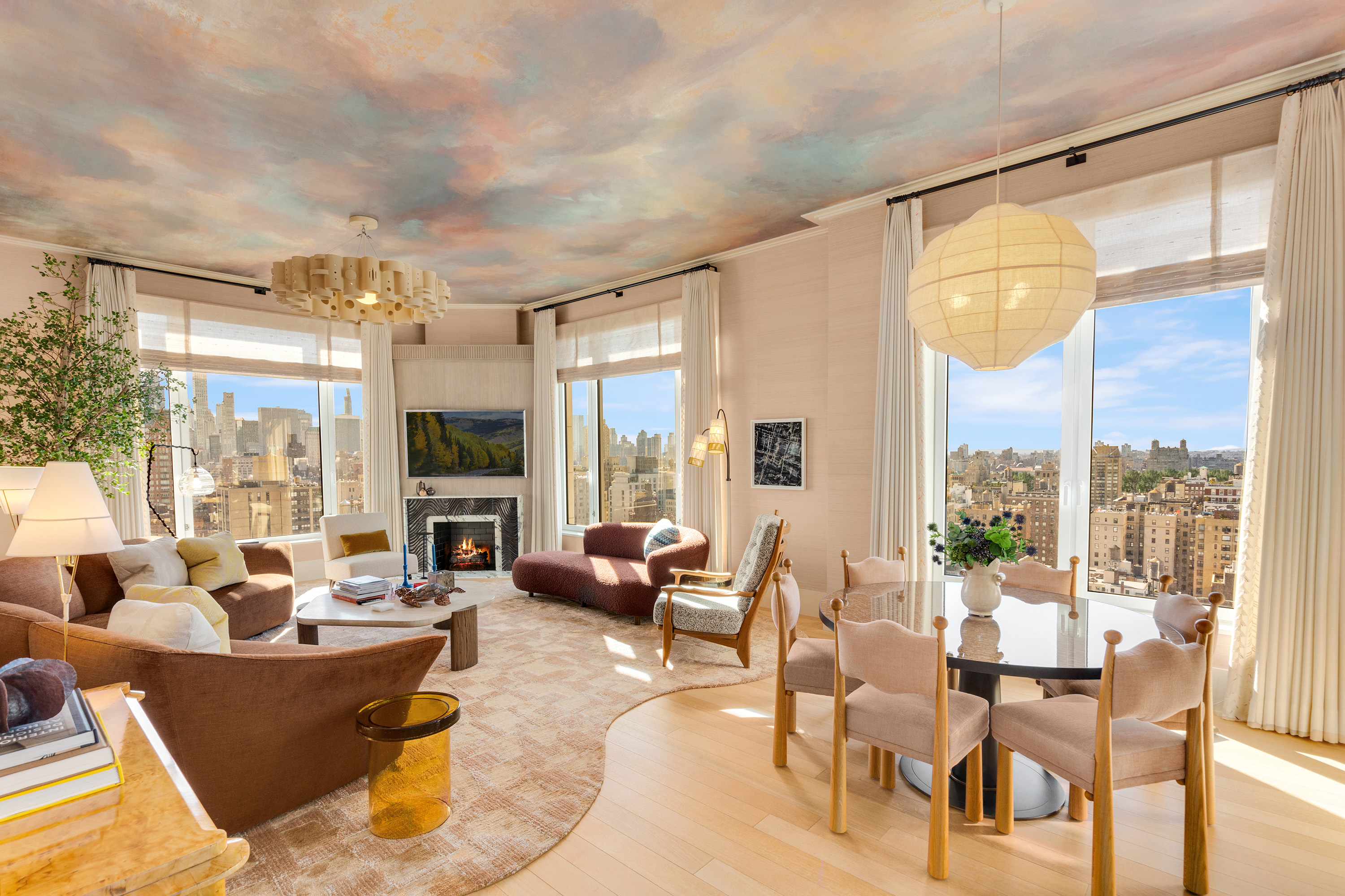 200 East 83rd Street, Unit 24C Manhattan, NY 10028 - Photo 2 of 35 a living room with furniture and a large window