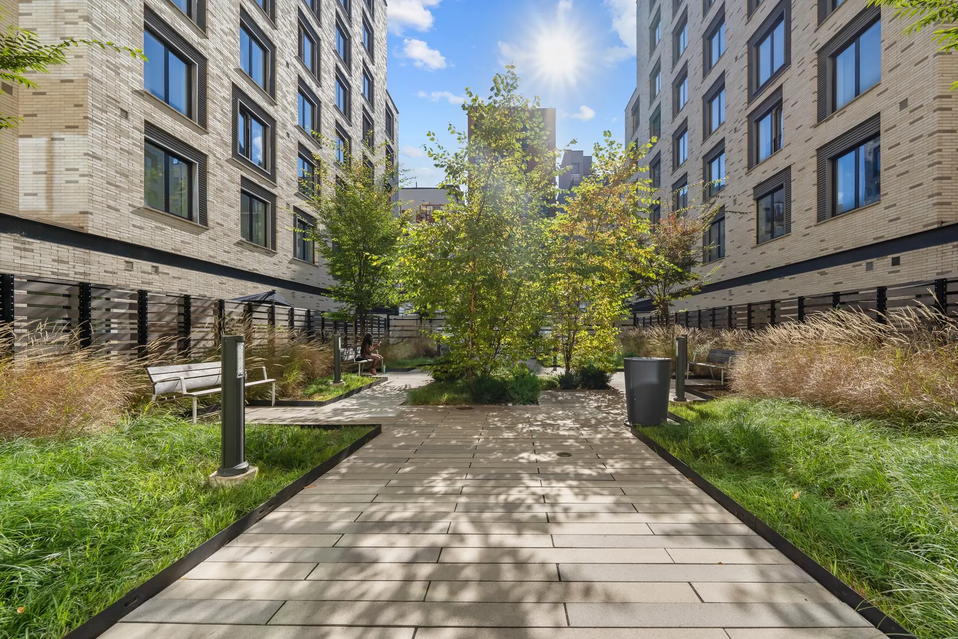 350 Clarkson Avenue, Unit 103 Brooklyn, NY 11226 - Photo 37 of 42 a view of a brick building next to a yard