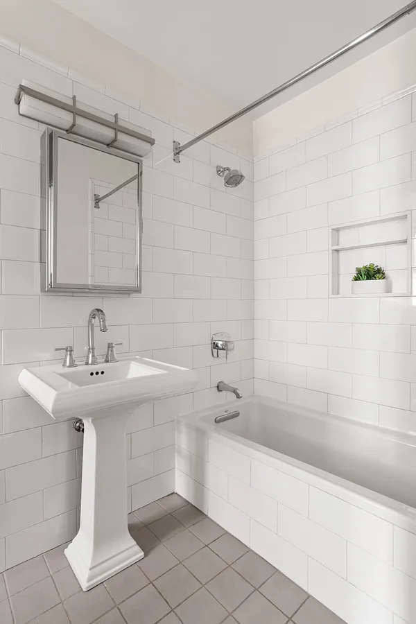 a bathroom with a sink and a bathtub