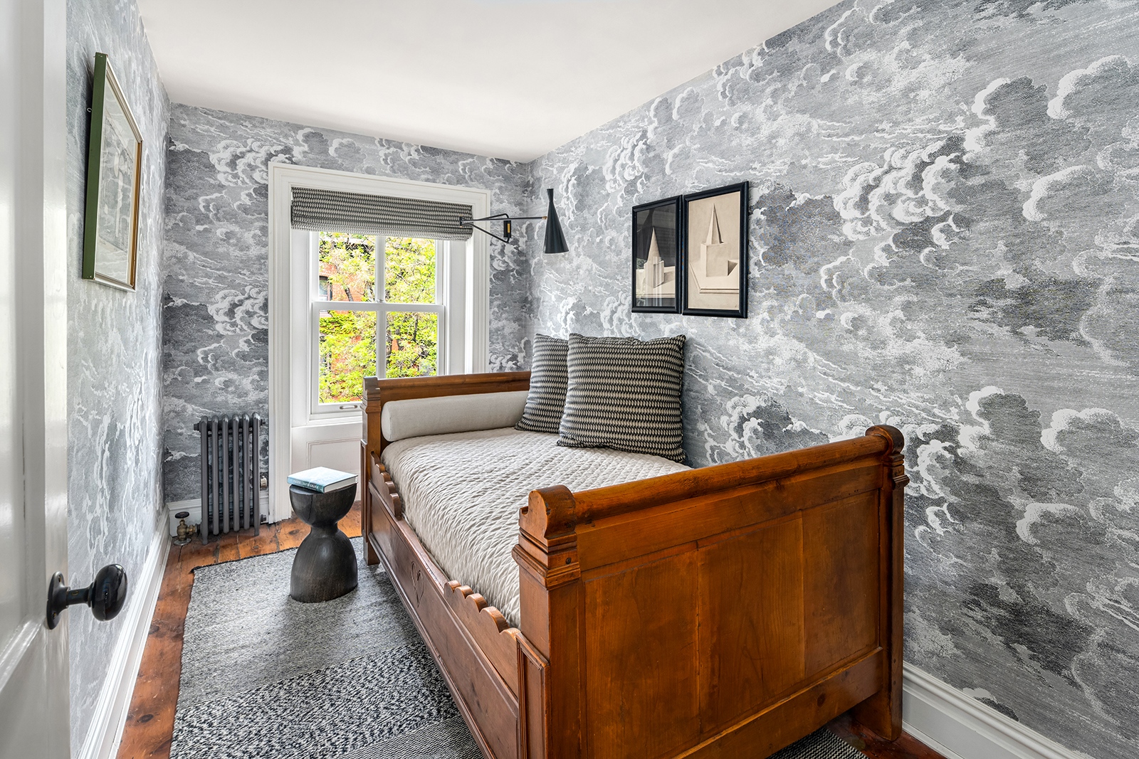 204 Warren Street Brooklyn, NY 11201 - Photo 15 of 29 a bedroom with a bed and a night stand