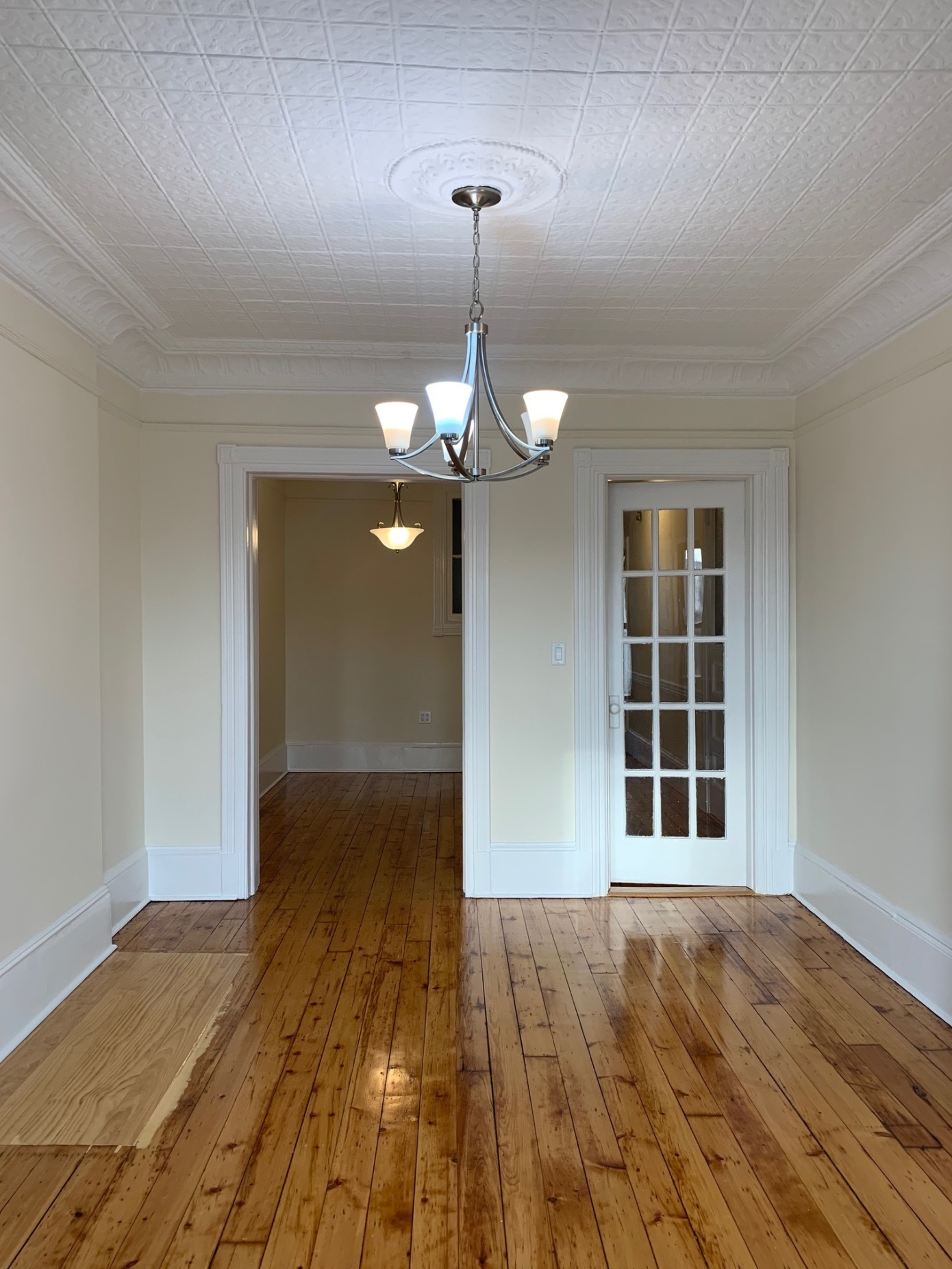 481 9th Street, Unit 4 Brooklyn, NY 11215 - Photo 6 of 33 a view of empty room with wooden floor and fan