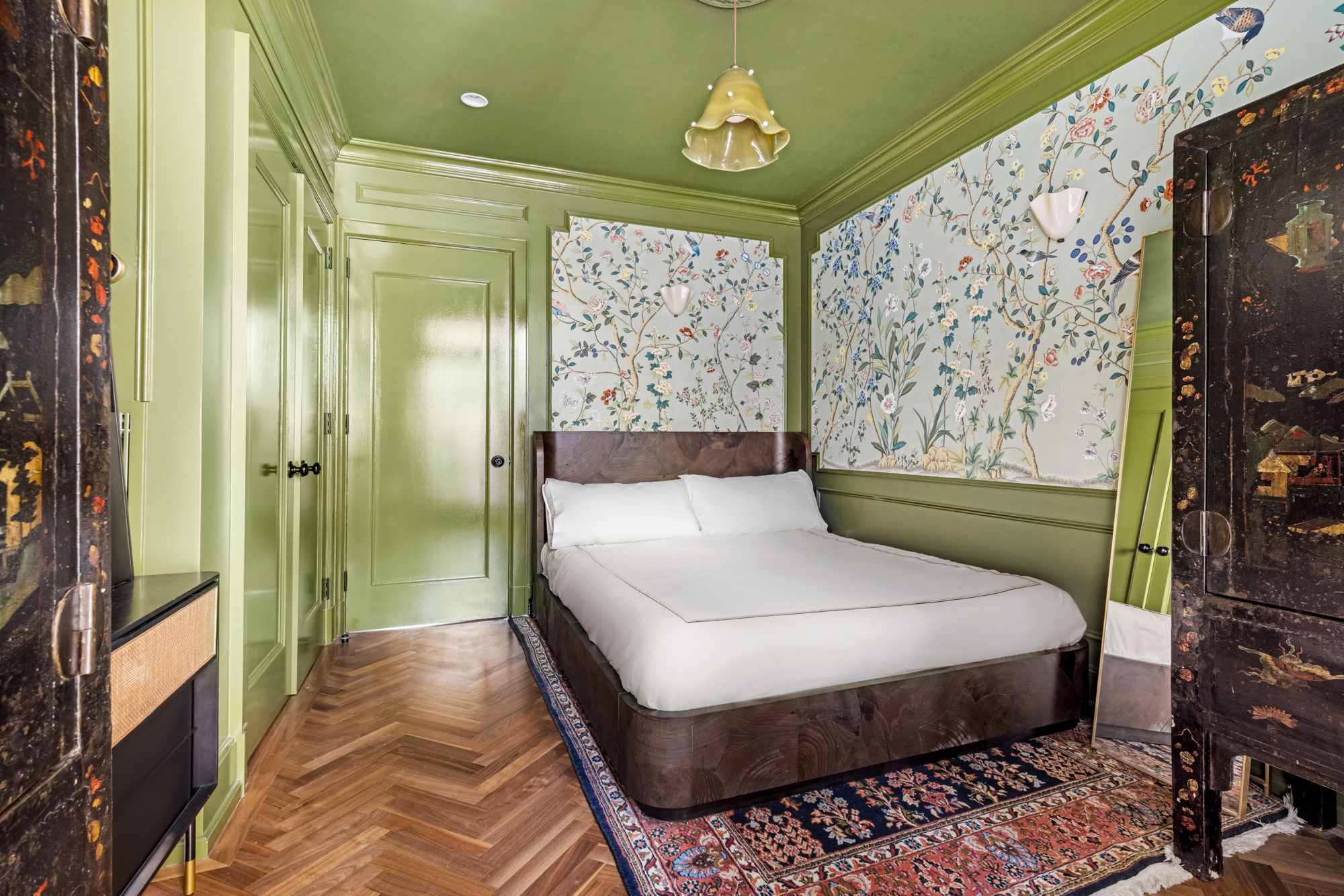 25 Prince Street, Unit 2A Manhattan, NY 10012 - Photo 8 of 11 a bedroom with a bed a mirror on the dresser and a window