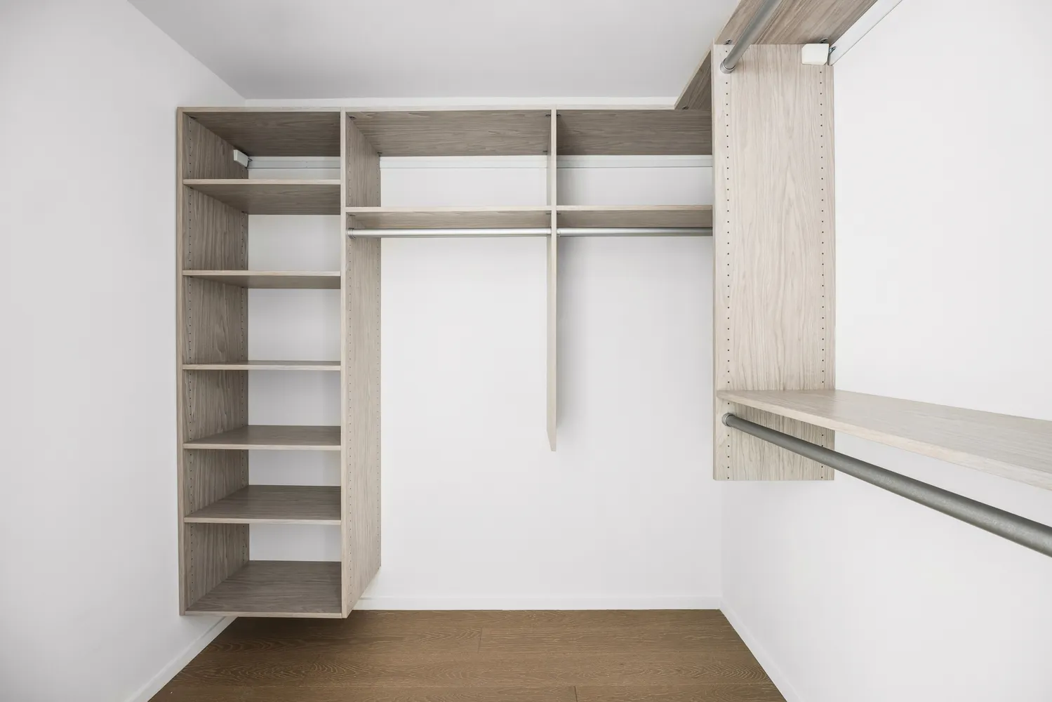 a view of an empty walk in closet