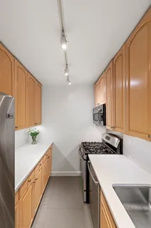 a kitchen with counter top space and appliances
