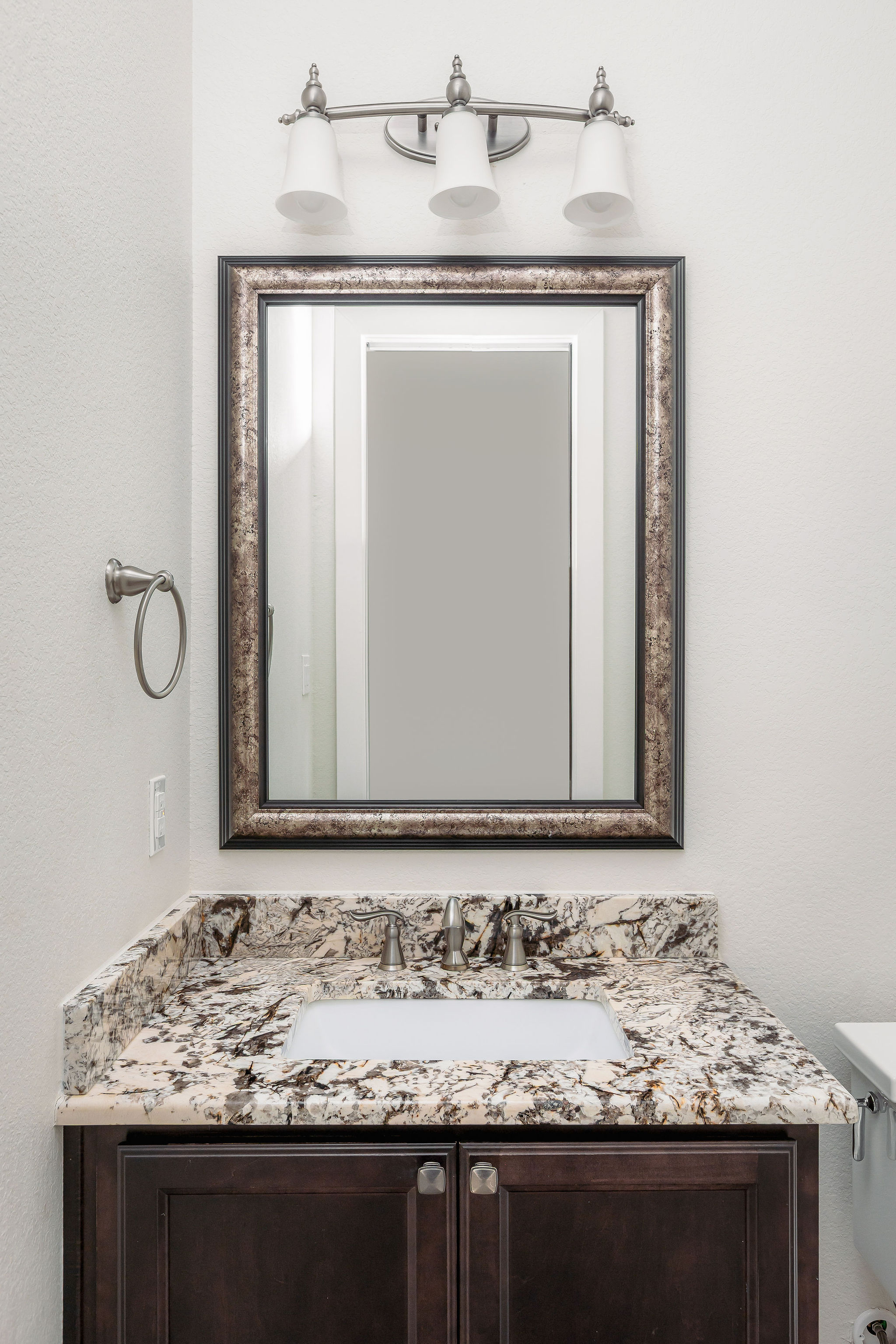812 Jennings Branch Georgetown, TX 78633 - Photo 62 of 100 a bathroom with a granite countertop sink and a mirror