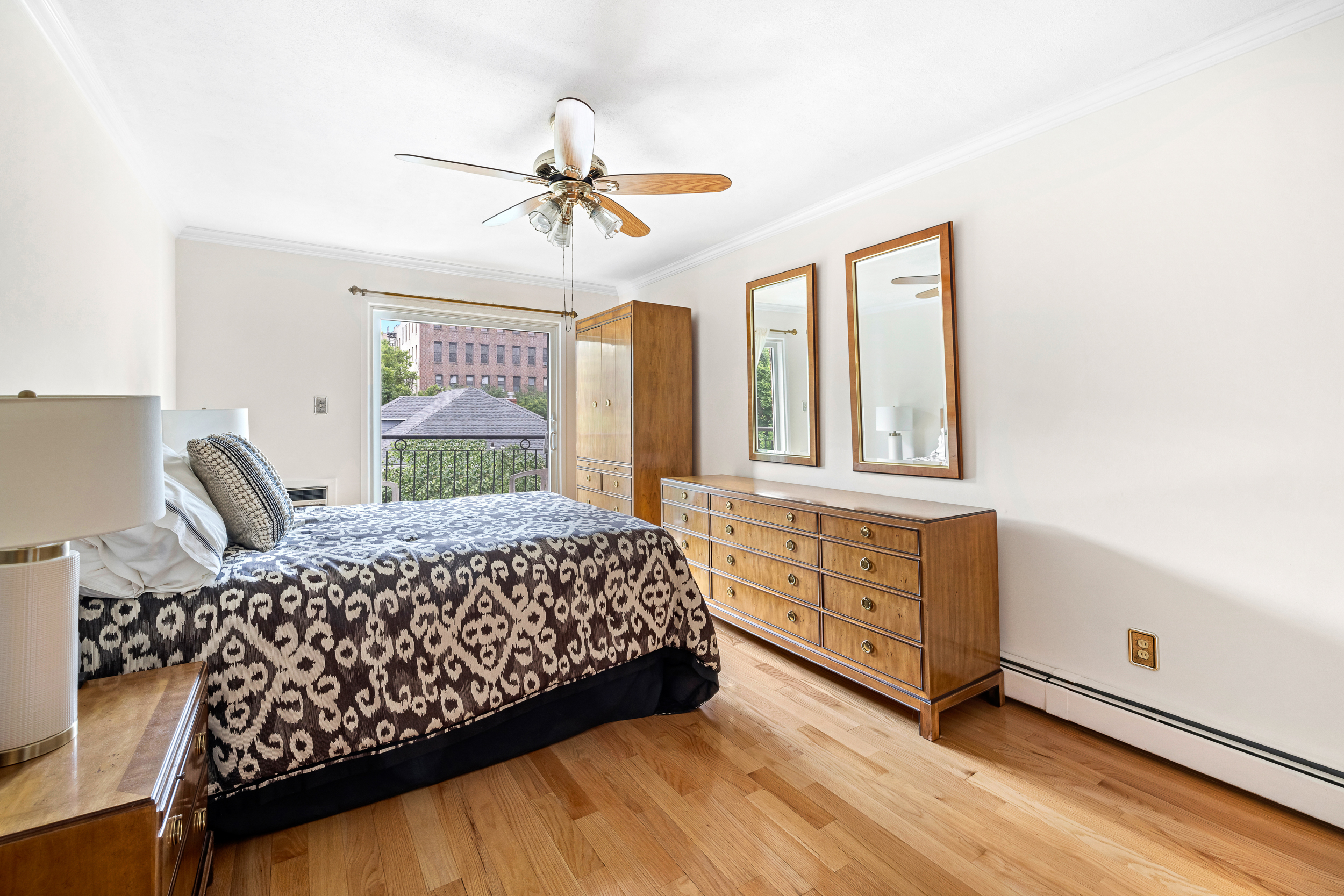436 78th Street, Unit 5 Brooklyn, NY 11209 - Photo 7 of 10 a bedroom with a bed and window