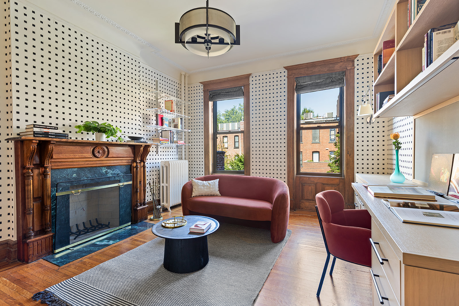 623 2nd Street Brooklyn, NY 11215 - Photo 10 of 26 a living room with furniture a window and a fireplace