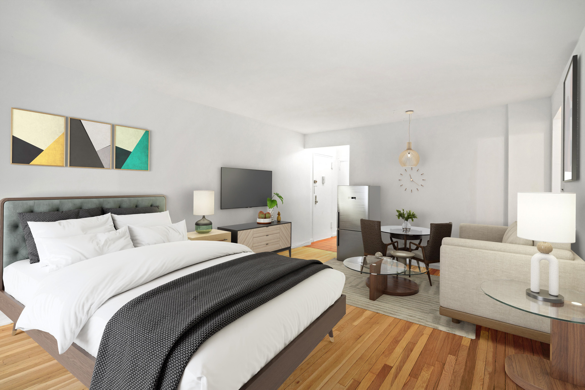 60 East 9th Street, Unit 235 Manhattan, NY 10003 - Photo 5 of 14 a bedroom with a bed and a couch