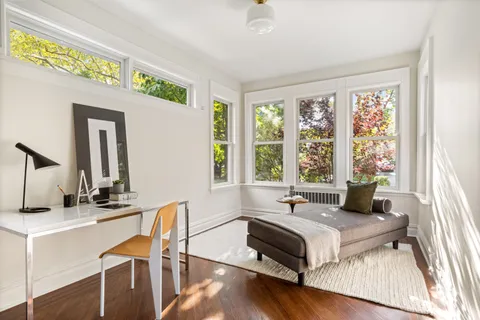 a kitchen with a stove a sink and a refrigerator