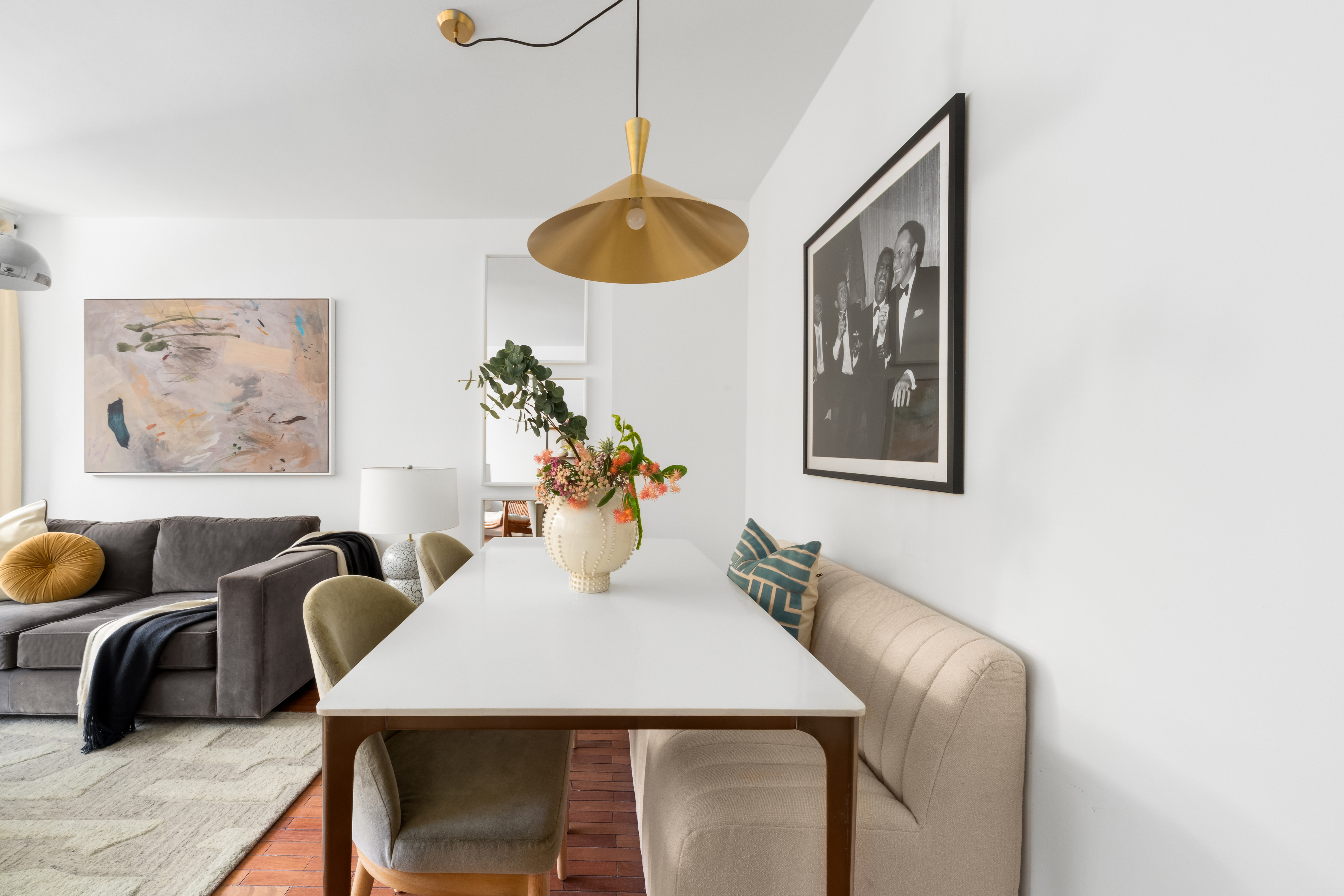 150 East 85th Street, Unit 3F Manhattan, NY 10028 - Photo 2 of 15 a dining room with furniture and window
