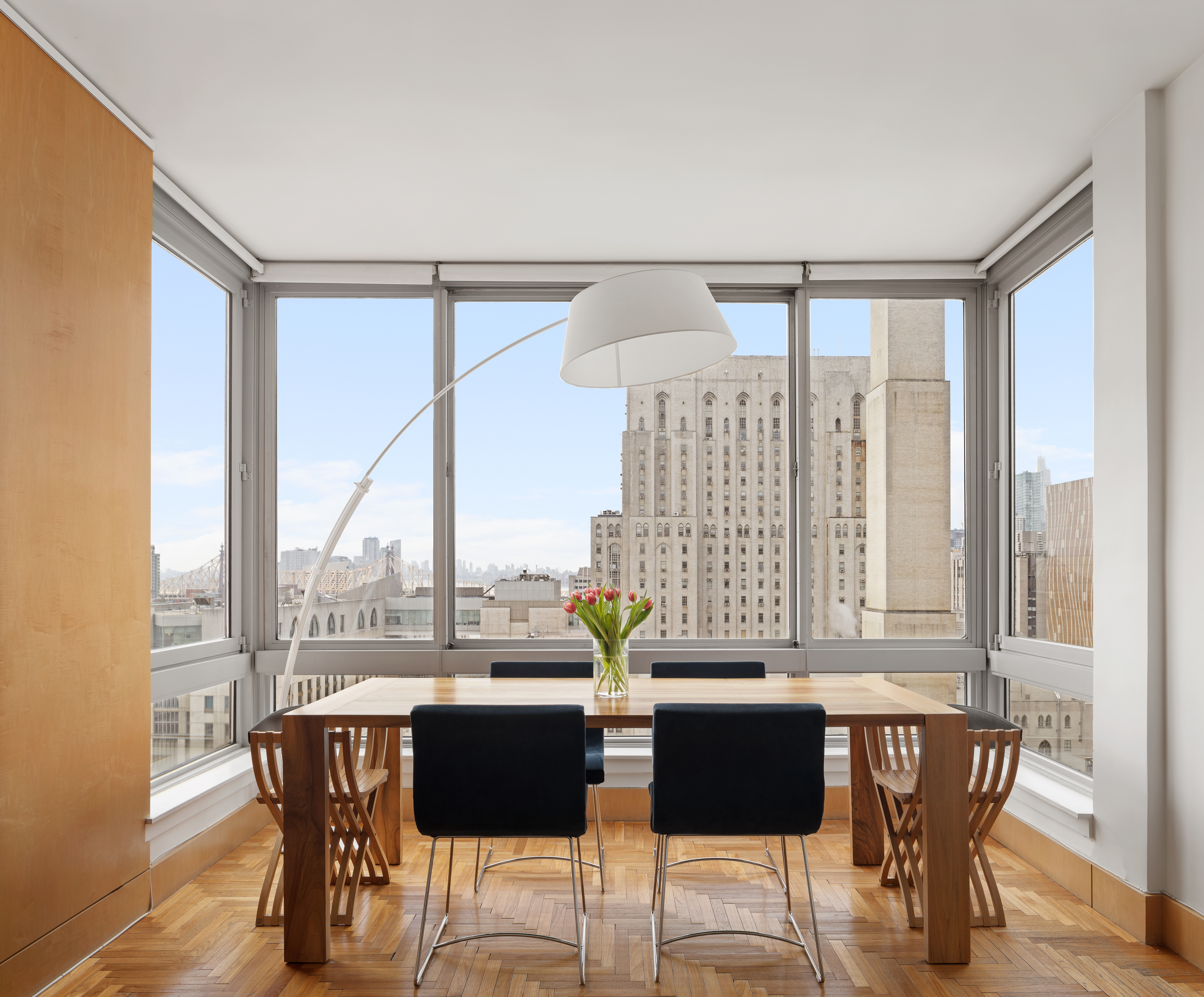 524 East 72nd Street, Unit 28DE Manhattan, NY 10021 - Photo 12 of 14 a living room with furniture and a window