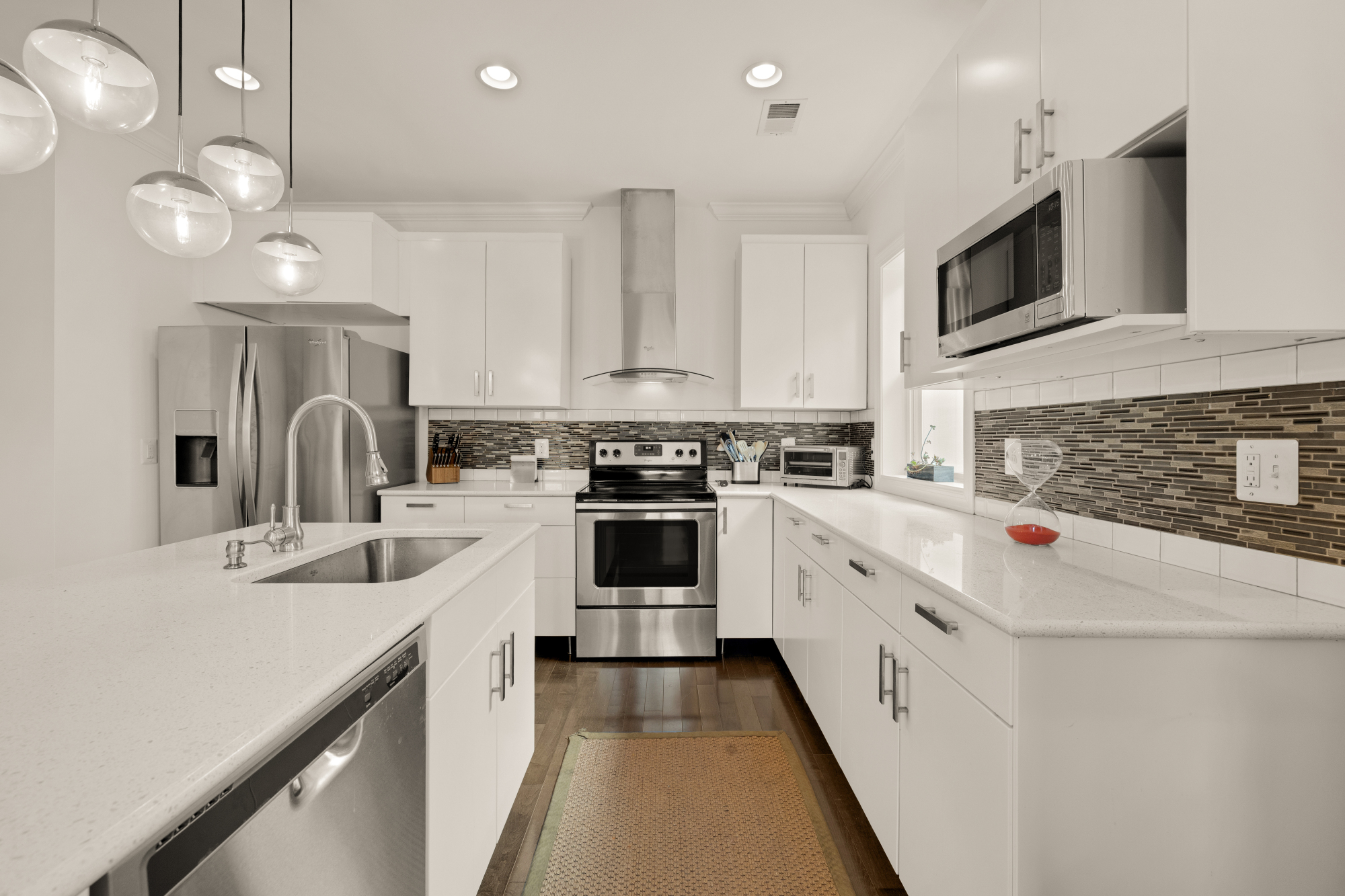 233 S Street Northeast, Unit 4 Washington, DC 20002 - Photo 14 of 37 a kitchen with a sink stove and microwave