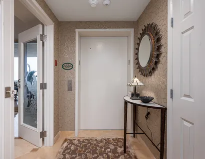 a view of bathroom with a mirror and a sink