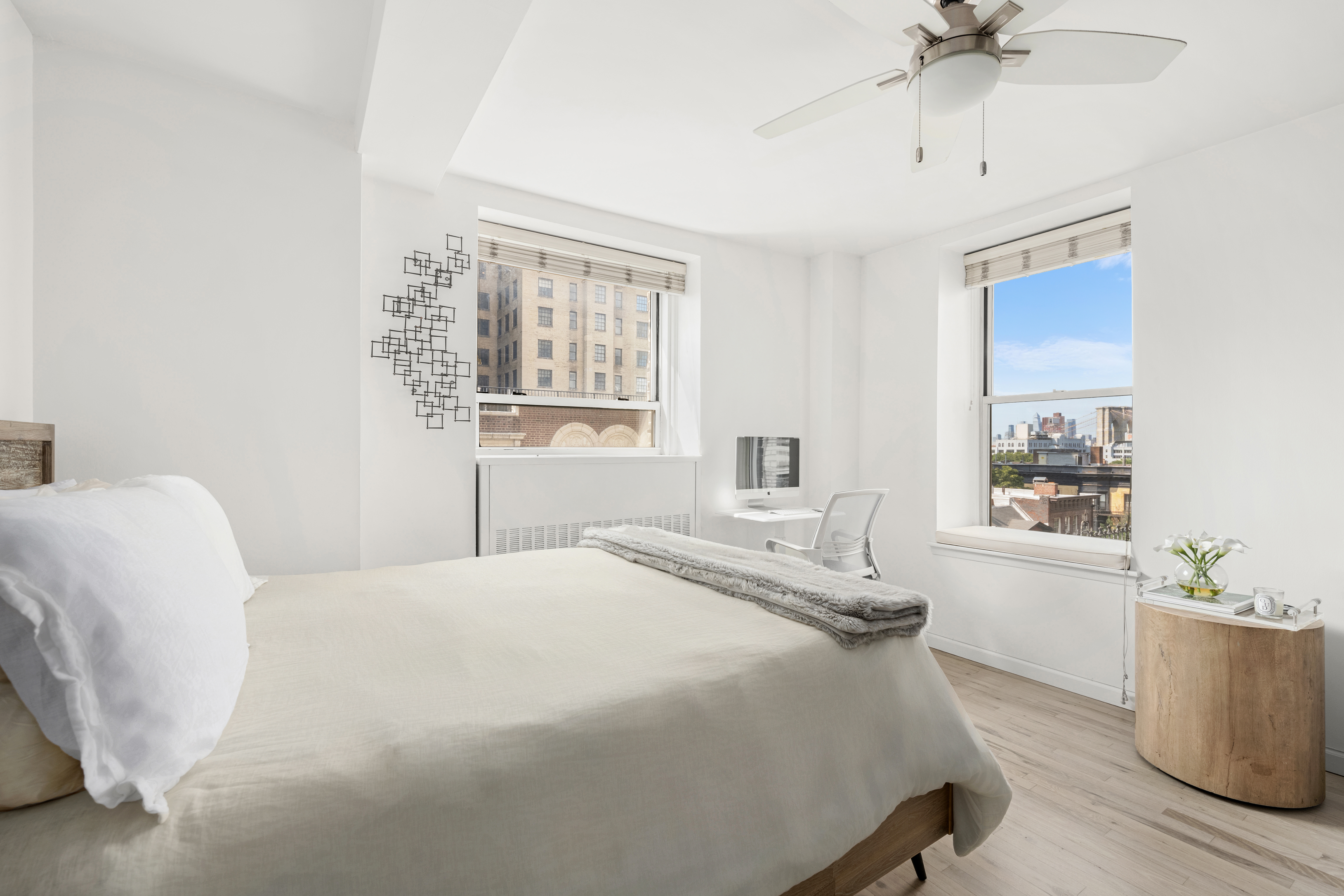 111 Hicks Street, Unit 6E Brooklyn, NY 11201 - Photo 3 of 11 a bedroom with a bed and a chandelier