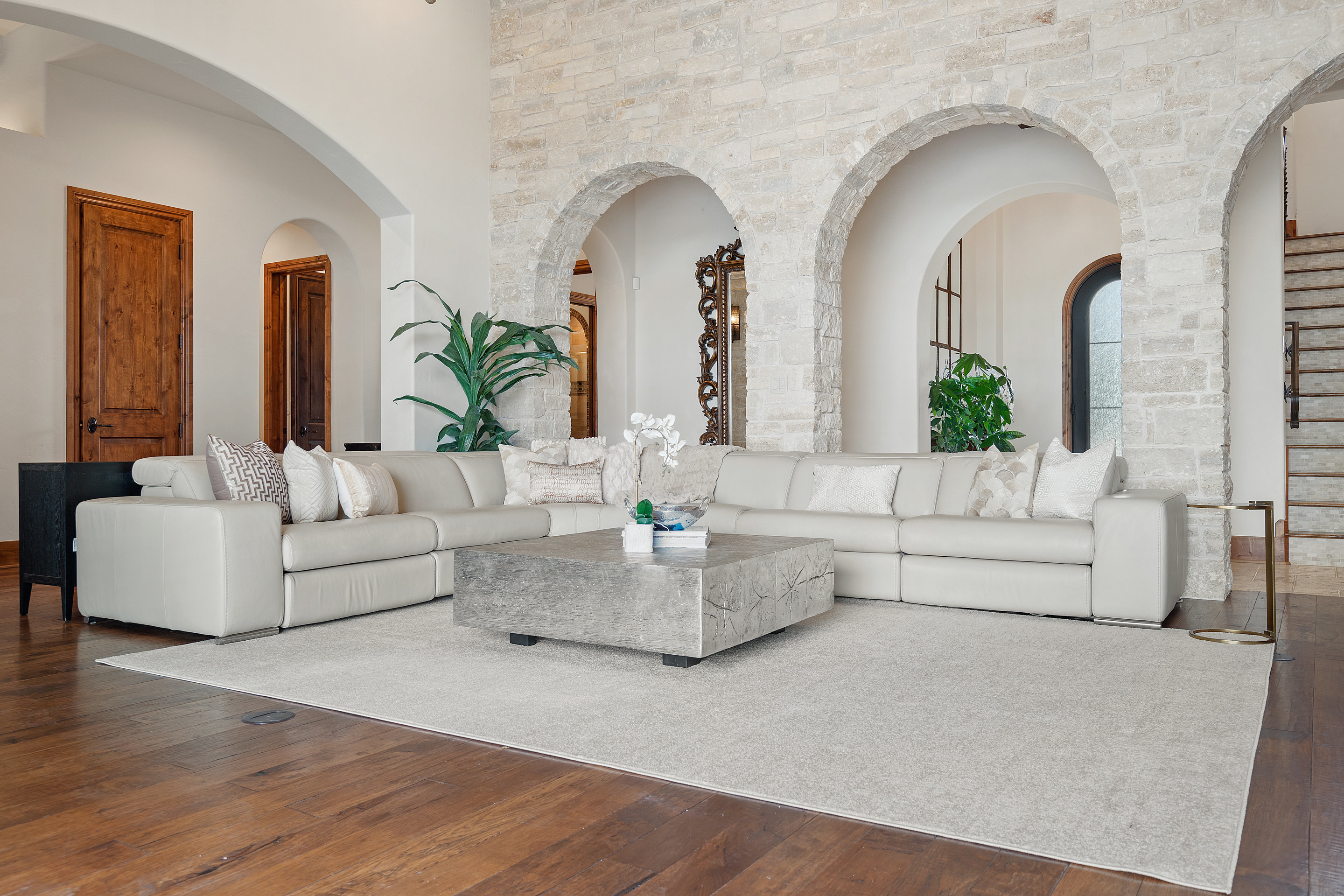 808 Rivercliff Drive Spicewood, TX 78669 - Photo 6 of 71 a living room with fireplace furniture and a potted plant