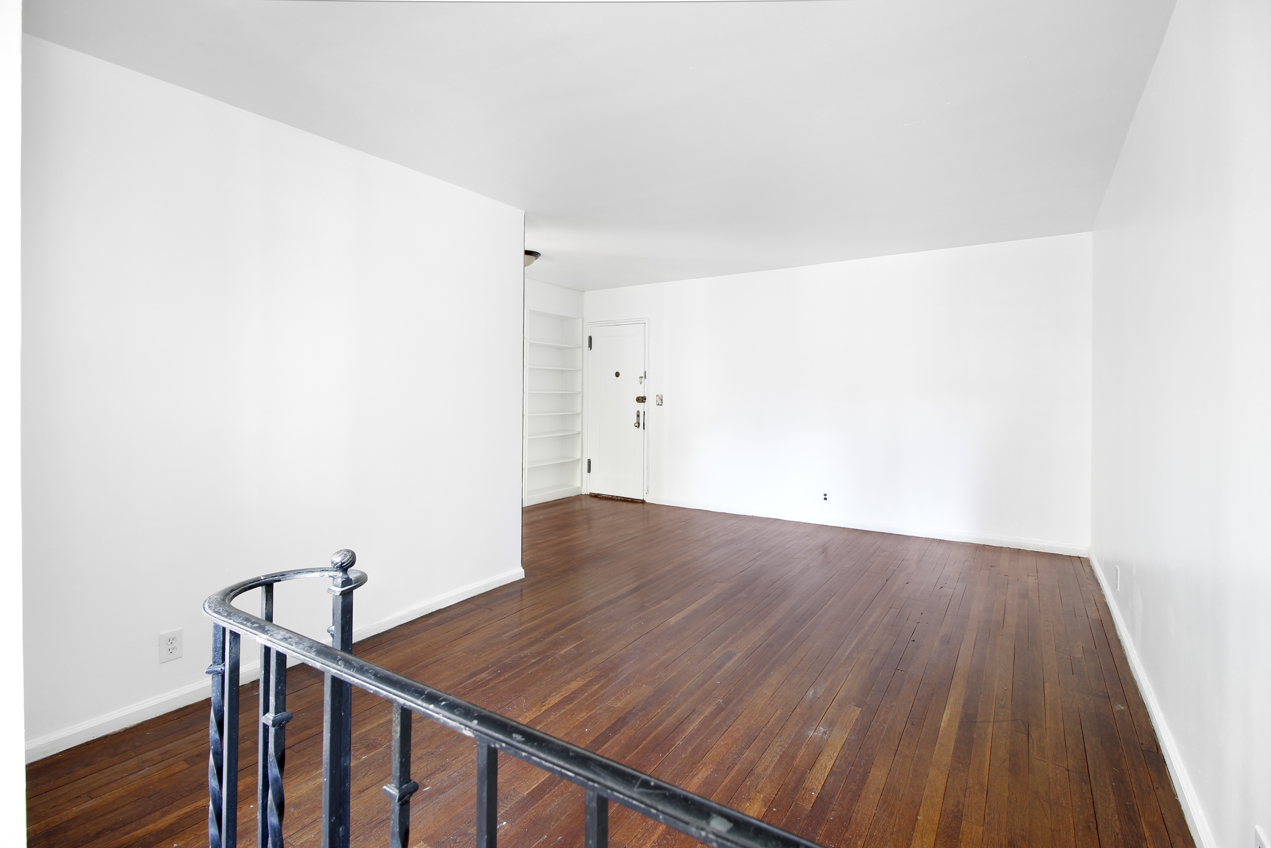 315 East 56th Street, Unit 5H Manhattan, NY 10022 - Photo 4 of 9 a view of a room with wooden floor