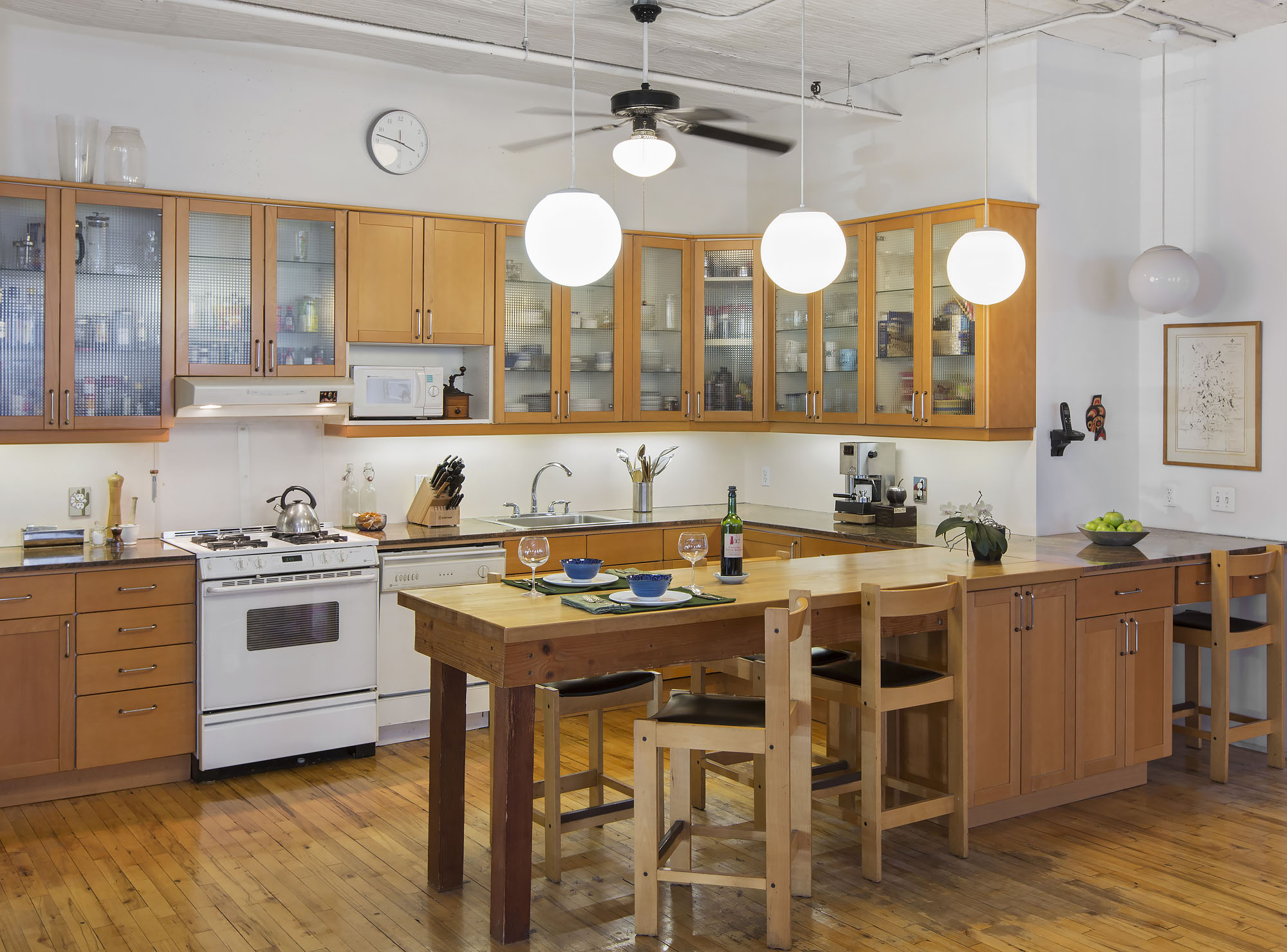 35 Bond Street Manhattan, NY 10012 - Photo 4 of 7 a kitchen with a stove a sink and a refrigerator