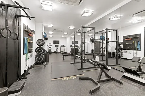 a view of a room with gym equipment