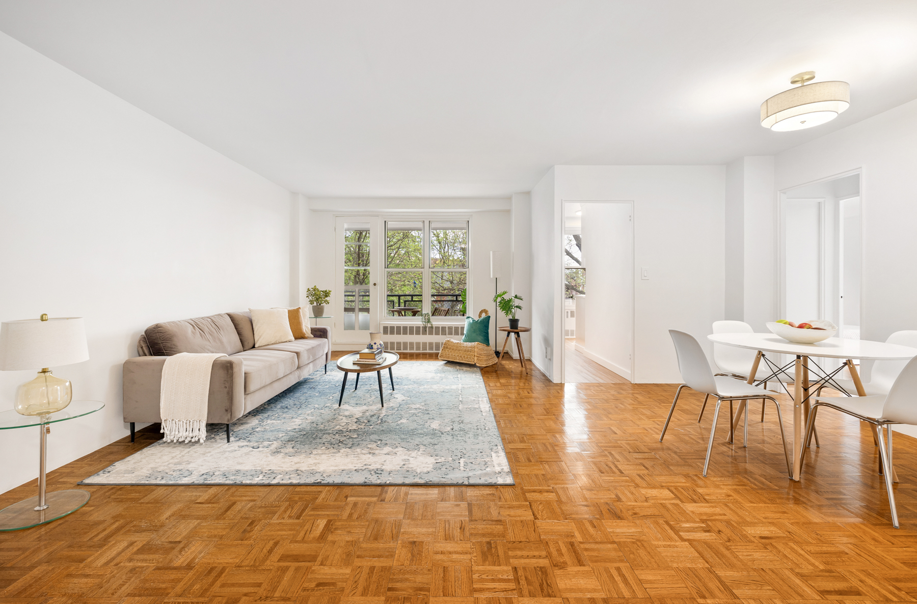 a living room with furniture and a table