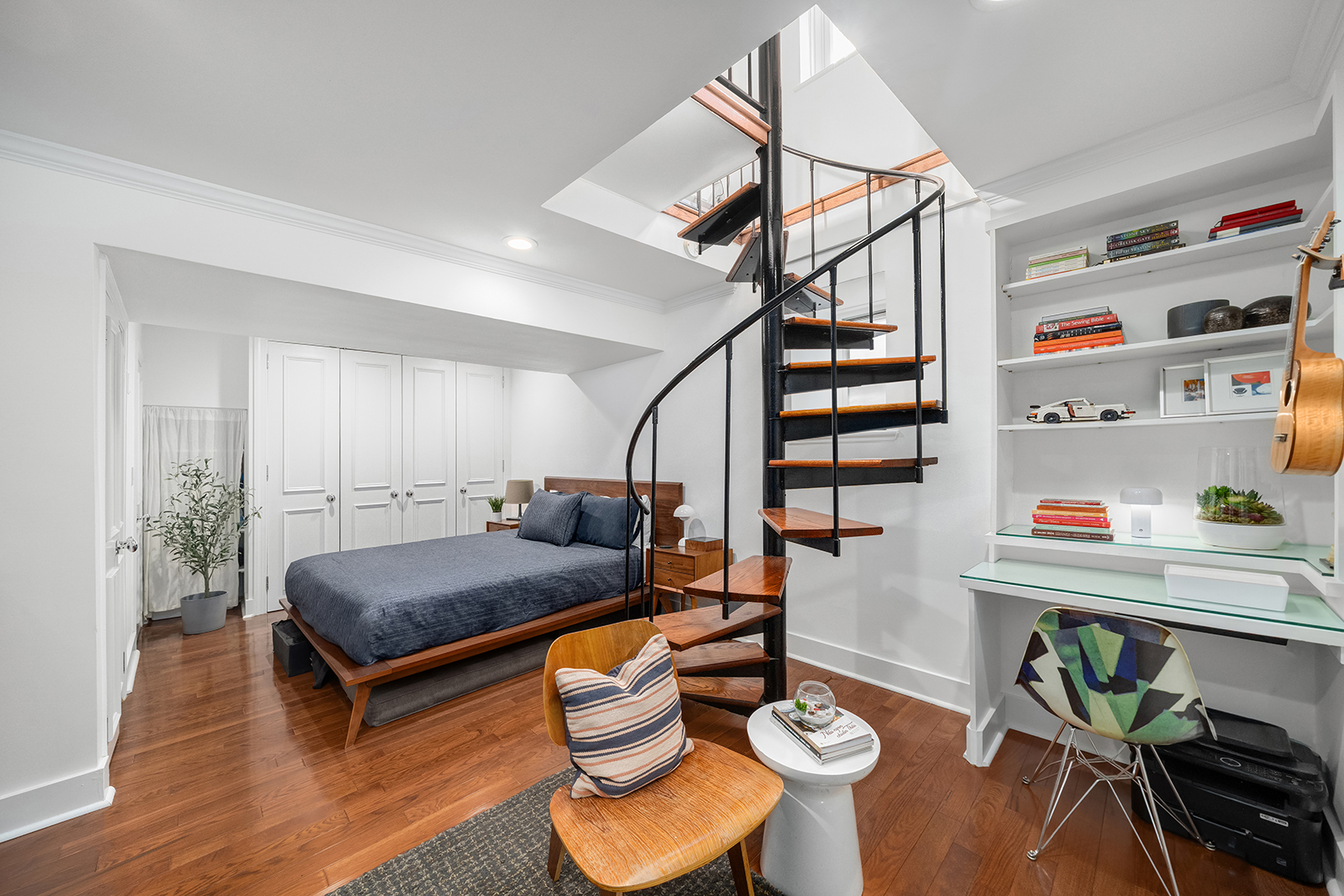 337 West 20th Street, Unit 1B Manhattan, NY 10011 - Photo 4 of 11 a living room with furniture and wooden floor