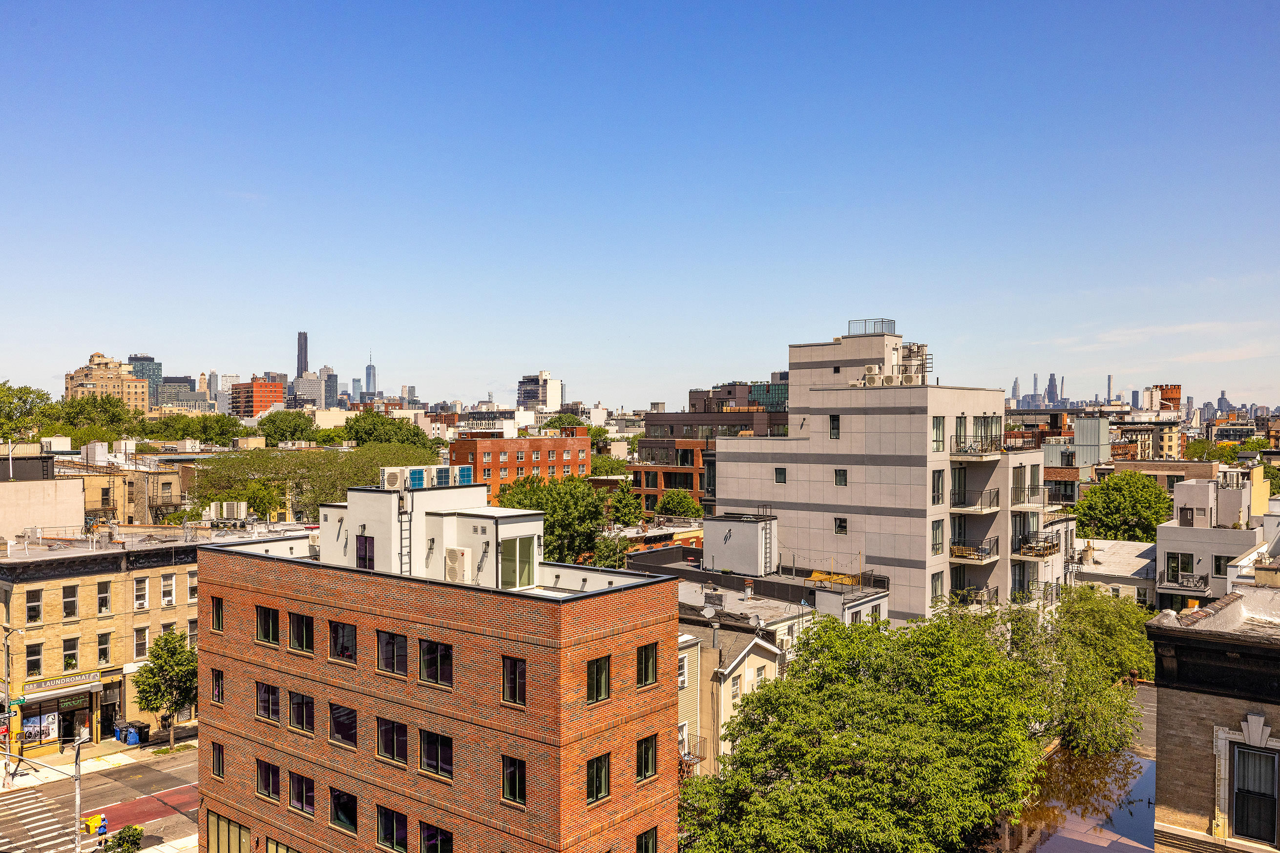 762 Park Place, Unit PH1 Brooklyn, NY 11216 - Photo 14 of 15 a view of a tall building