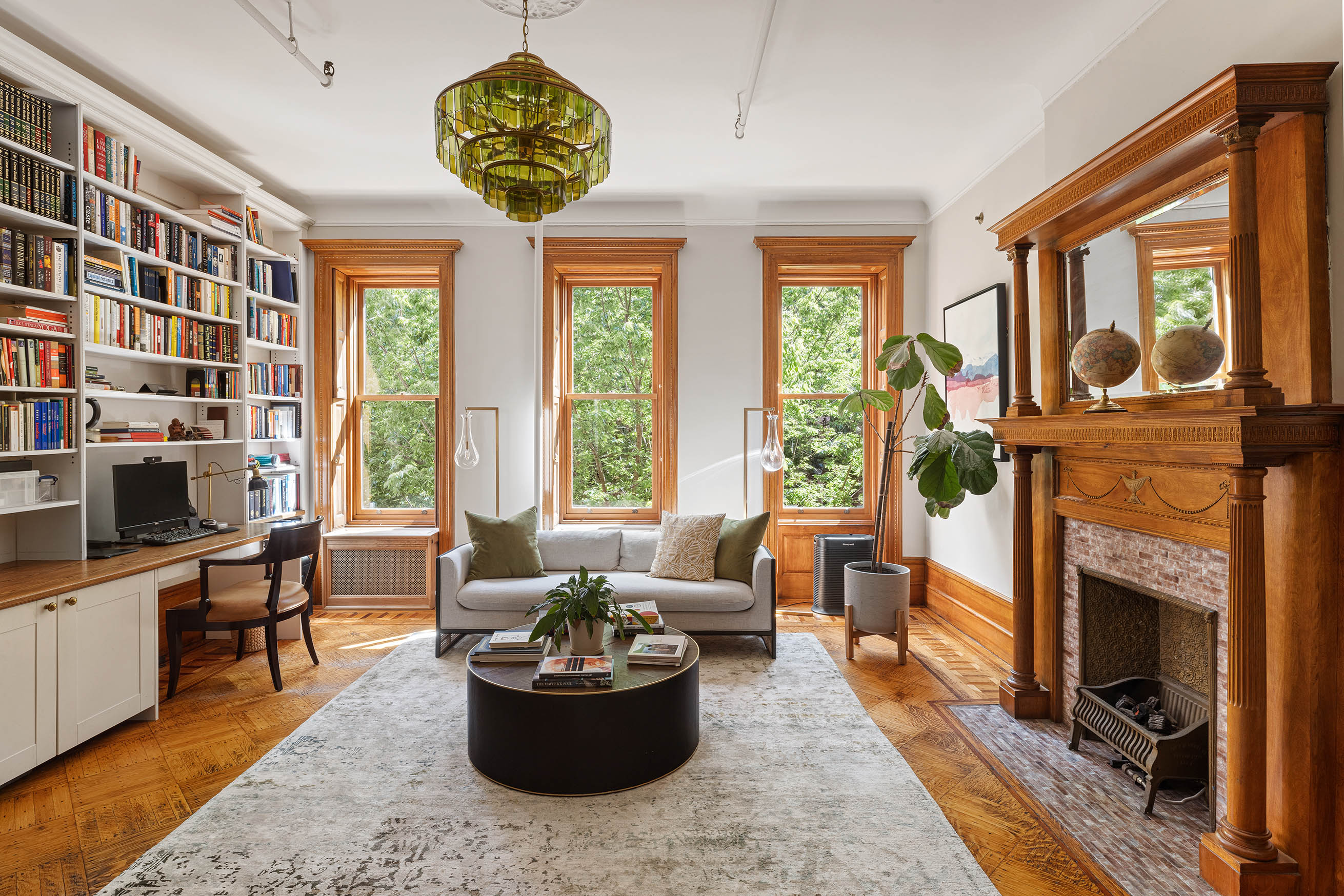 89 West 119th Street Manhattan, NY 10026 - Photo 8 of 22 a living room with fireplace furniture and a large window