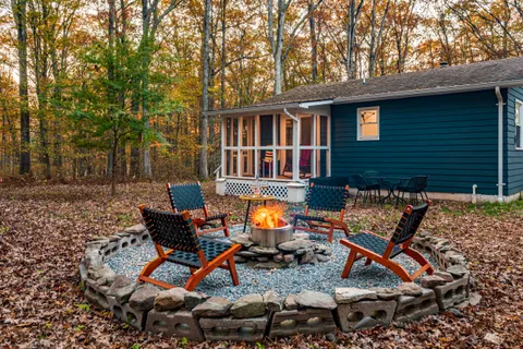 a backyard of a house with seating space