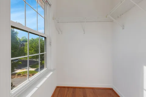 a view of a room that has a window in it