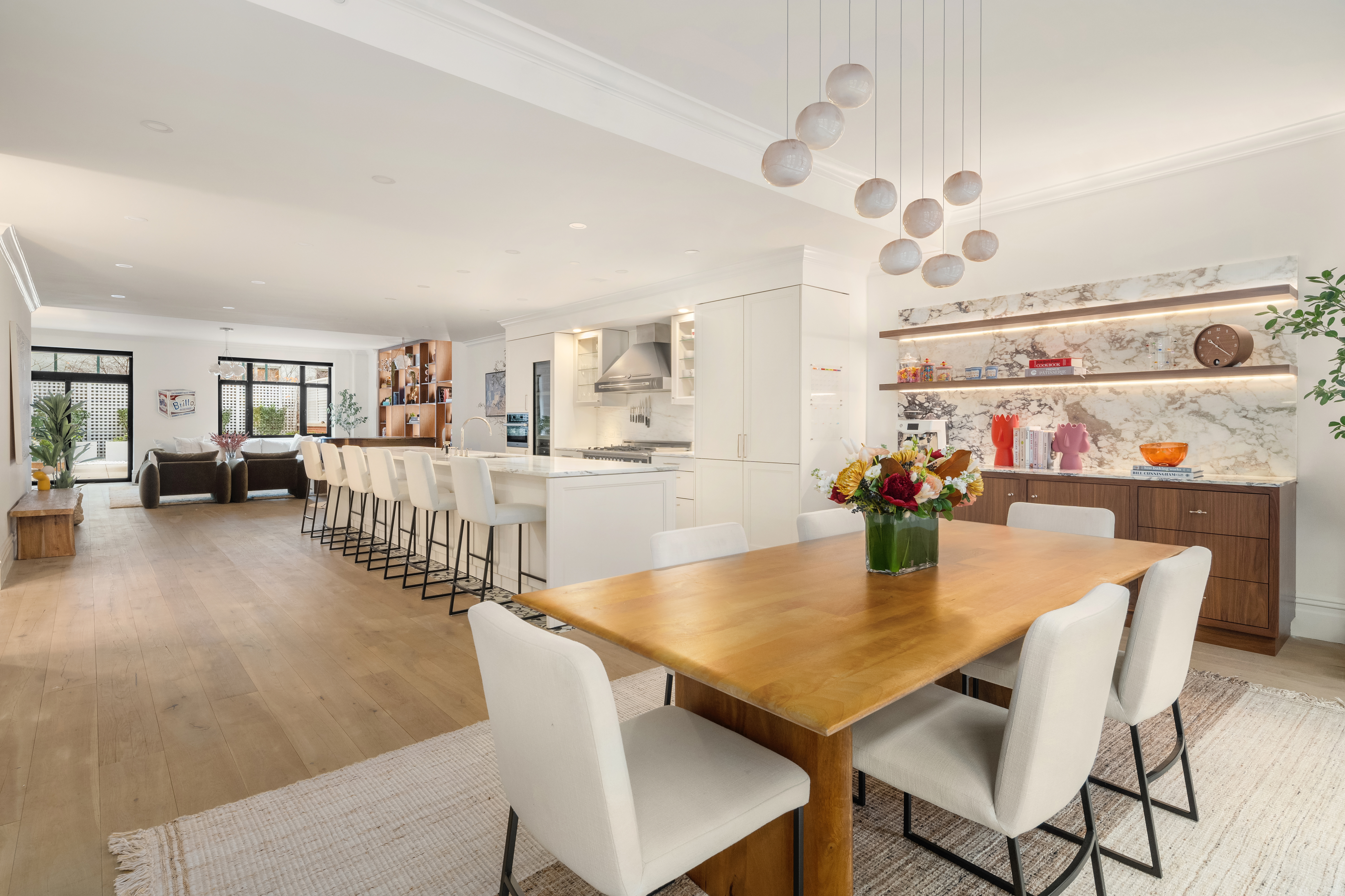 199 Mott Street, Unit 2 Manhattan, NY 10012 - Photo 7 of 14 a view of a dining room with furniture and a kitchen
