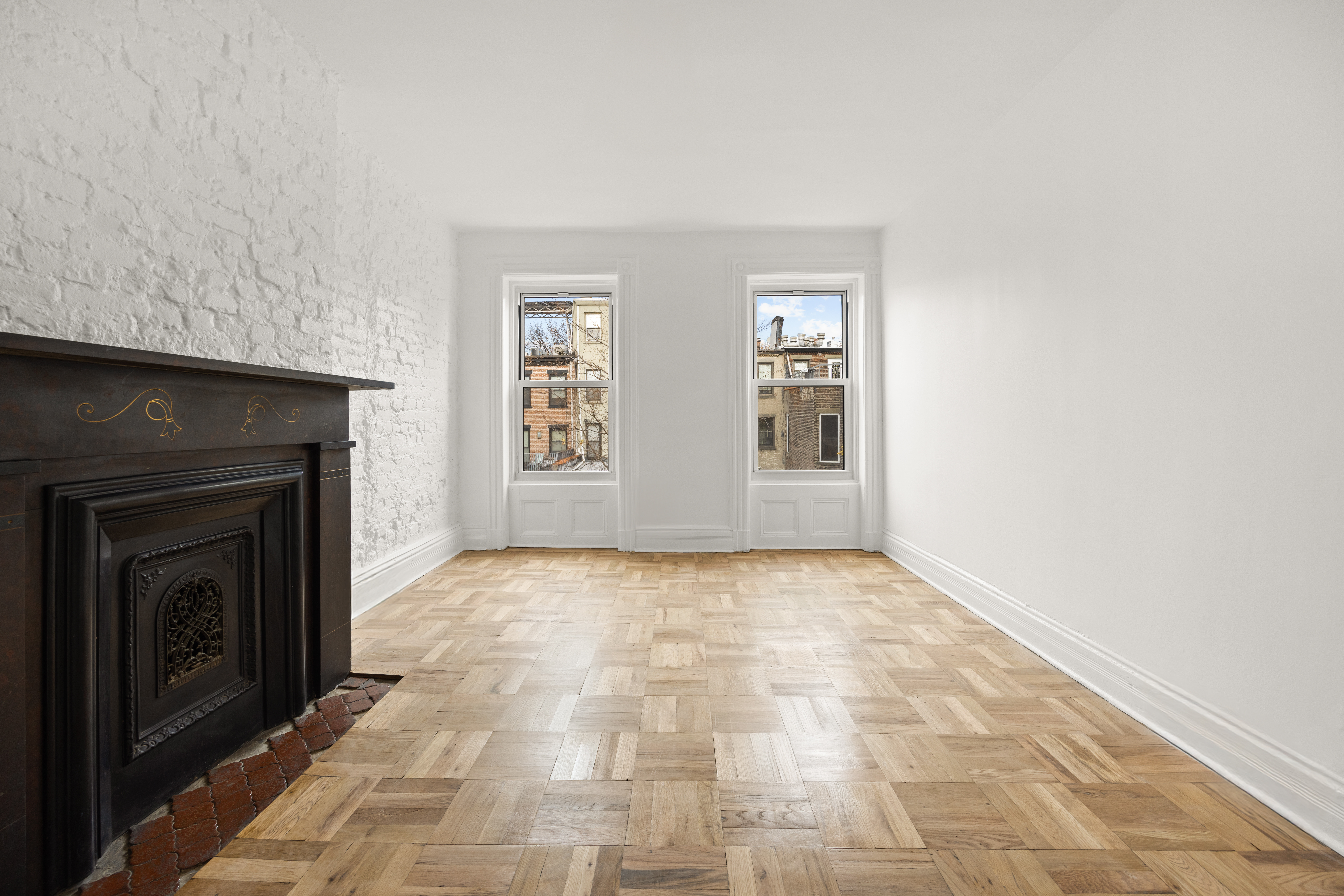 485 1st Street, Unit 2 Brooklyn, NY 11215 - Photo 7 of 17 an empty room with windows and fireplace