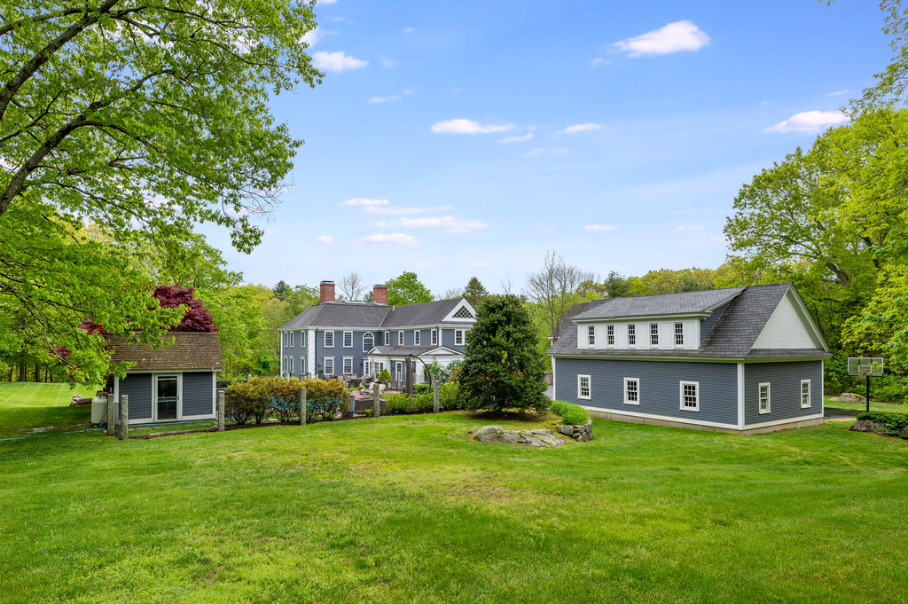 79 Pine Street Dover, MA 02030 - Photo 24 of 25 a view of house with a garden