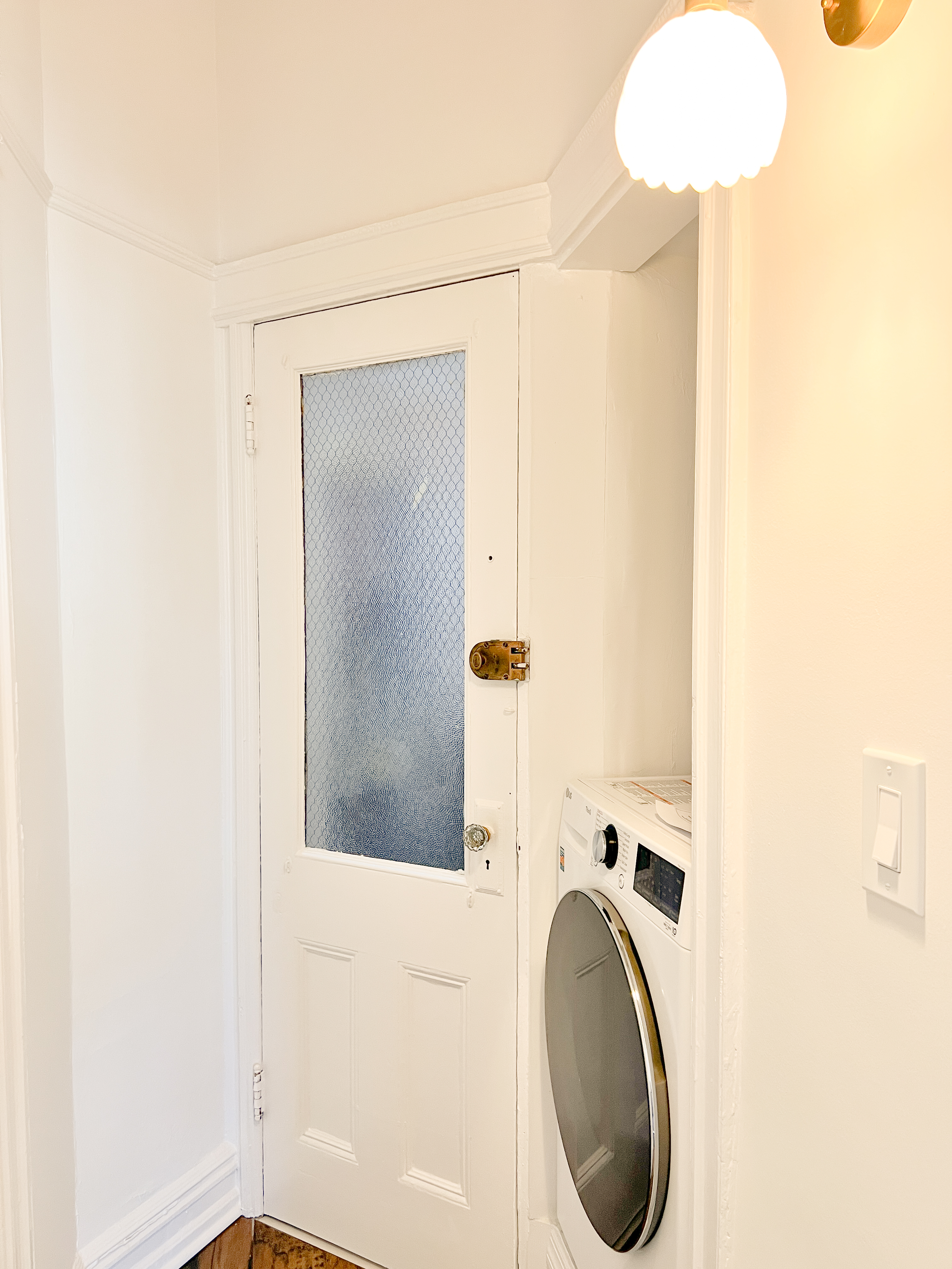 271 71st Street, Unit 2 Brooklyn, NY 11209 - Photo 9 of 10 a bathroom with a sink and a mirror