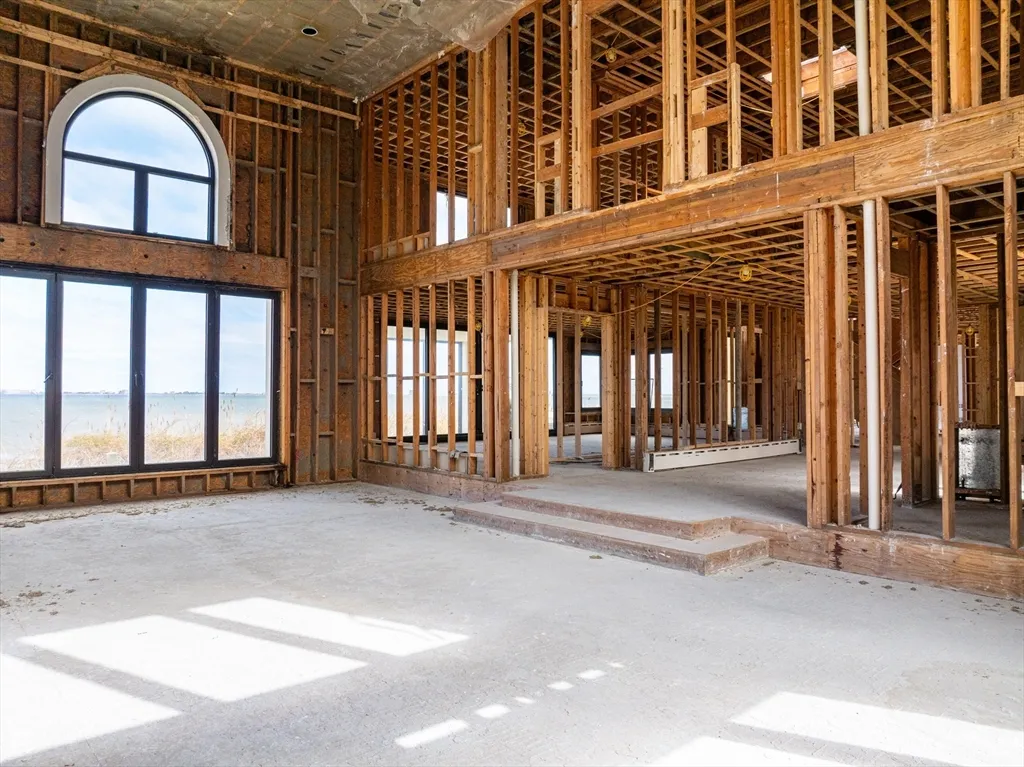 a view of a room with wooden walls