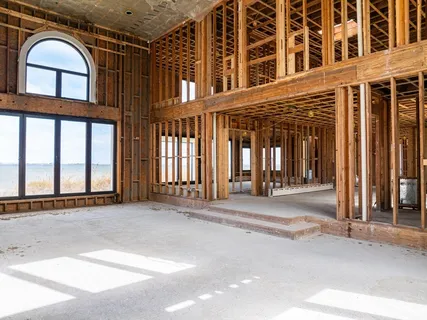 a view of a room with wooden walls