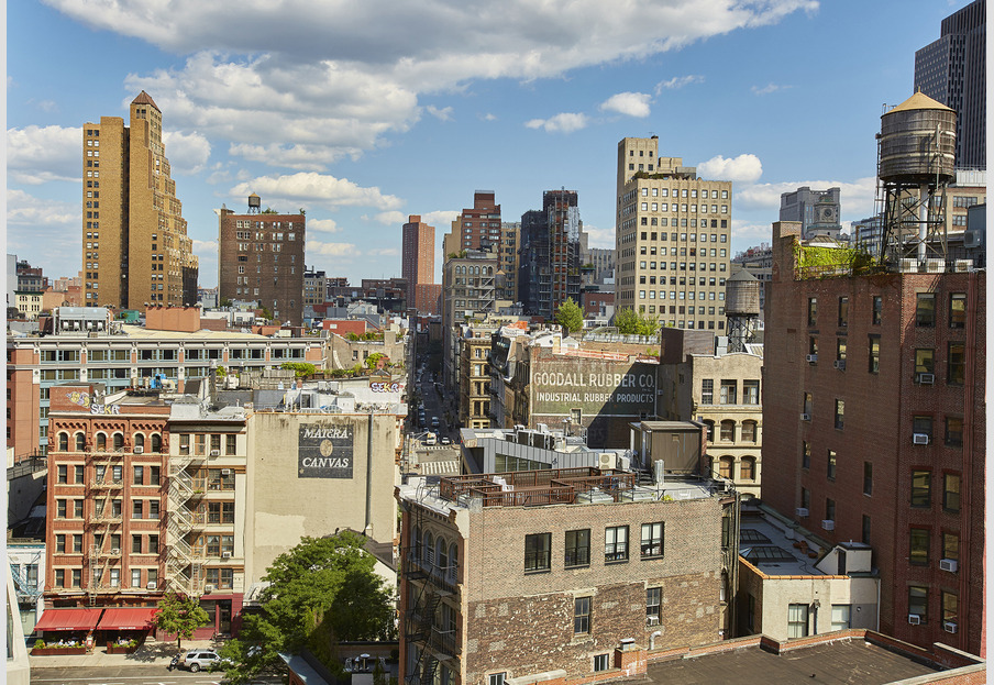 25 North Moore Street, Unit 10B Manhattan, NY 10013 - Photo 14 of 15 a view of city with tall buildings