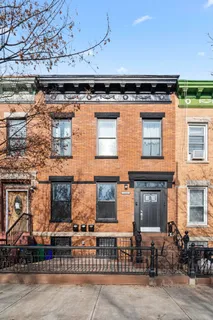 front view of a building with a street