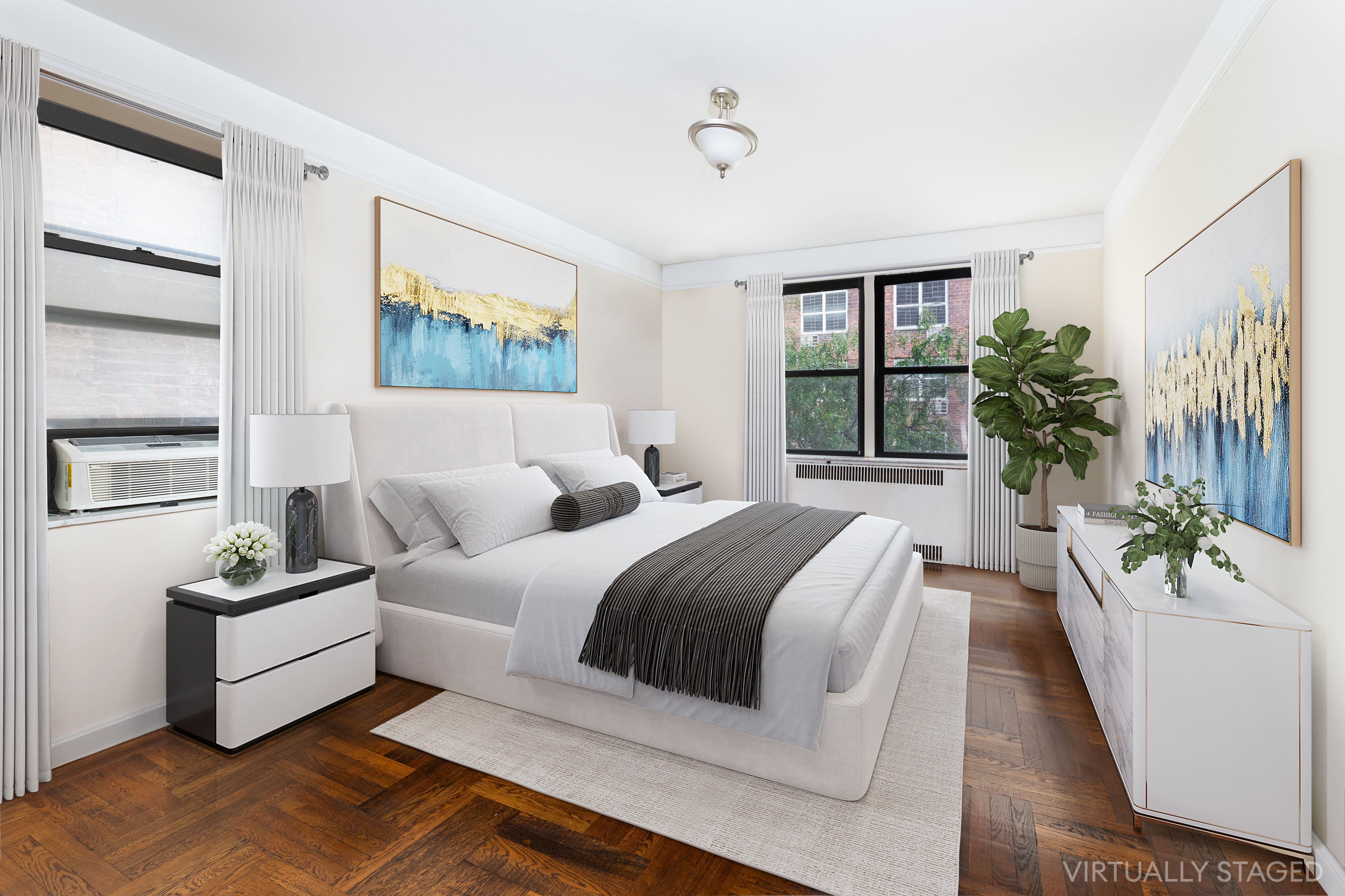 402 East 74th Street, Unit 4B Manhattan, NY 10021 - Photo 3 of 9 a spacious bedroom with a bed and a couch