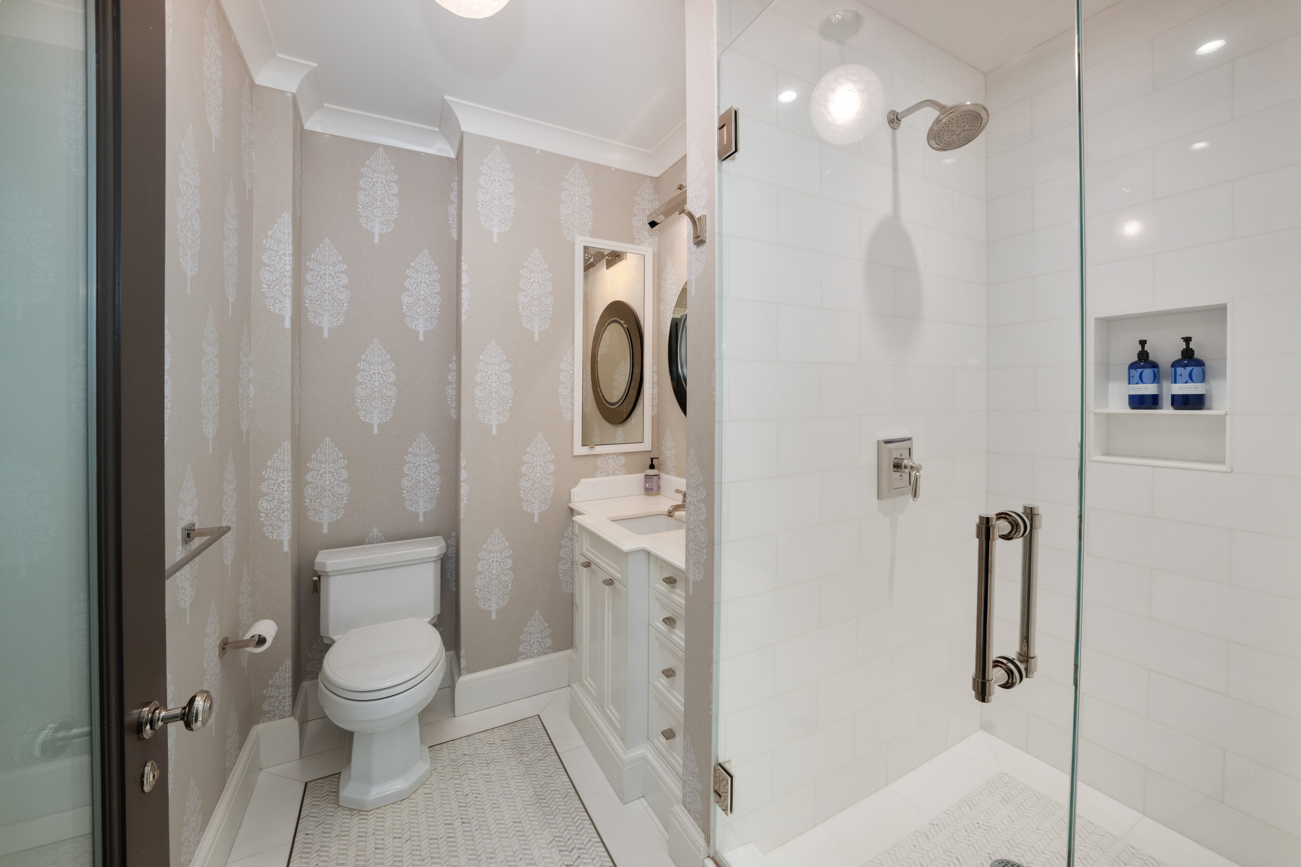 850 Park Avenue, Unit 9C Manhattan, NY 10075 - Photo 12 of 14 a bathroom with a shower a toilet and sink