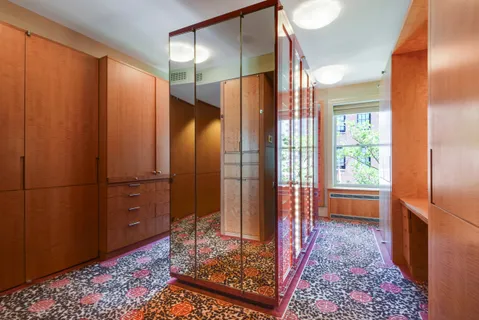 a view of a bathroom with tub and shower