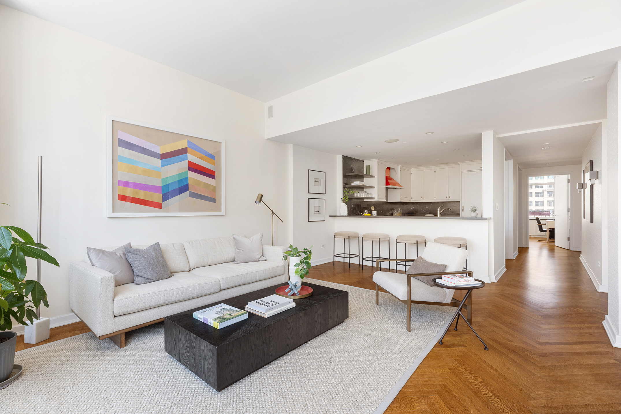 201 West 17th Street, Unit PHF Manhattan, NY 10011 - Photo 5 of 22 a living room with furniture and a wooden floor