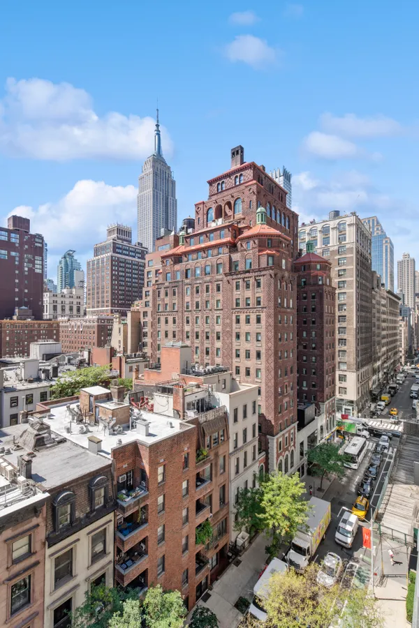 a view of a city with tall buildings