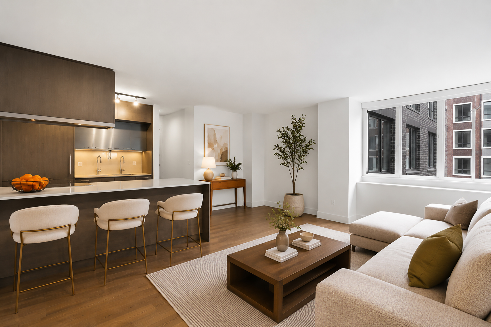 a living room with furniture and wooden floor