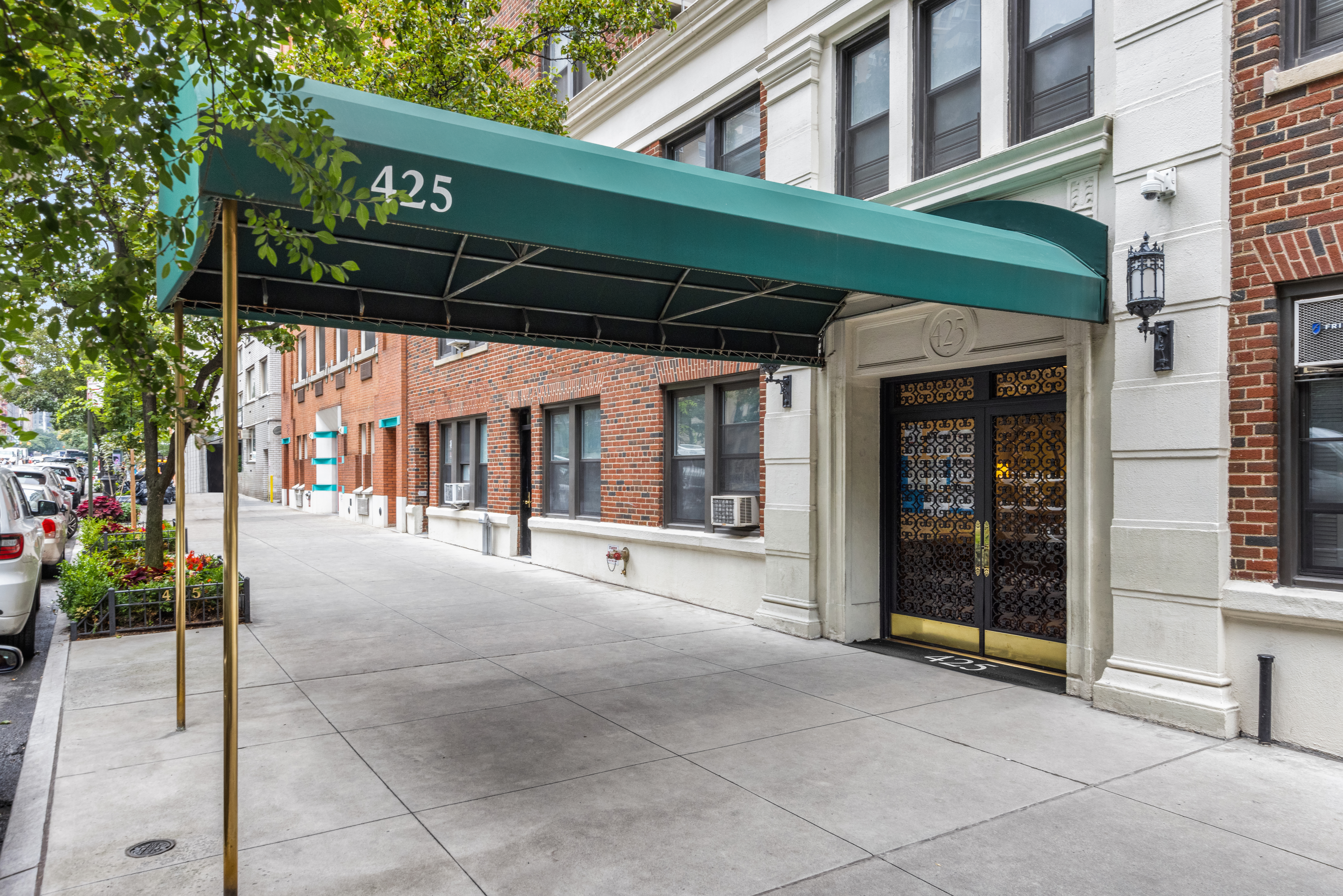 425 East 86th Street, Unit 2F Manhattan, NY 10028 - Photo 10 of 11 a view of a building with a door and a porch